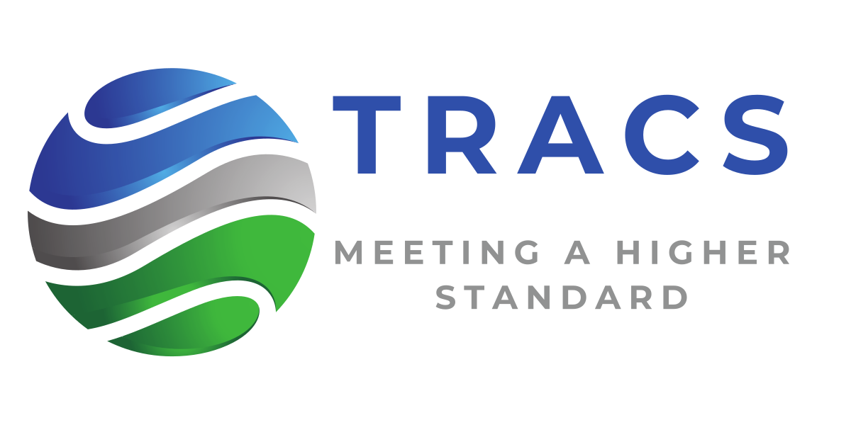 Logo for TRACS, featuring a blue, gray, and green globe with the word 