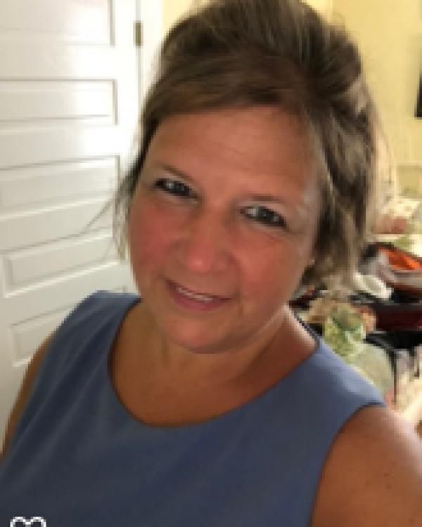 Ms. Kelly Walsh
