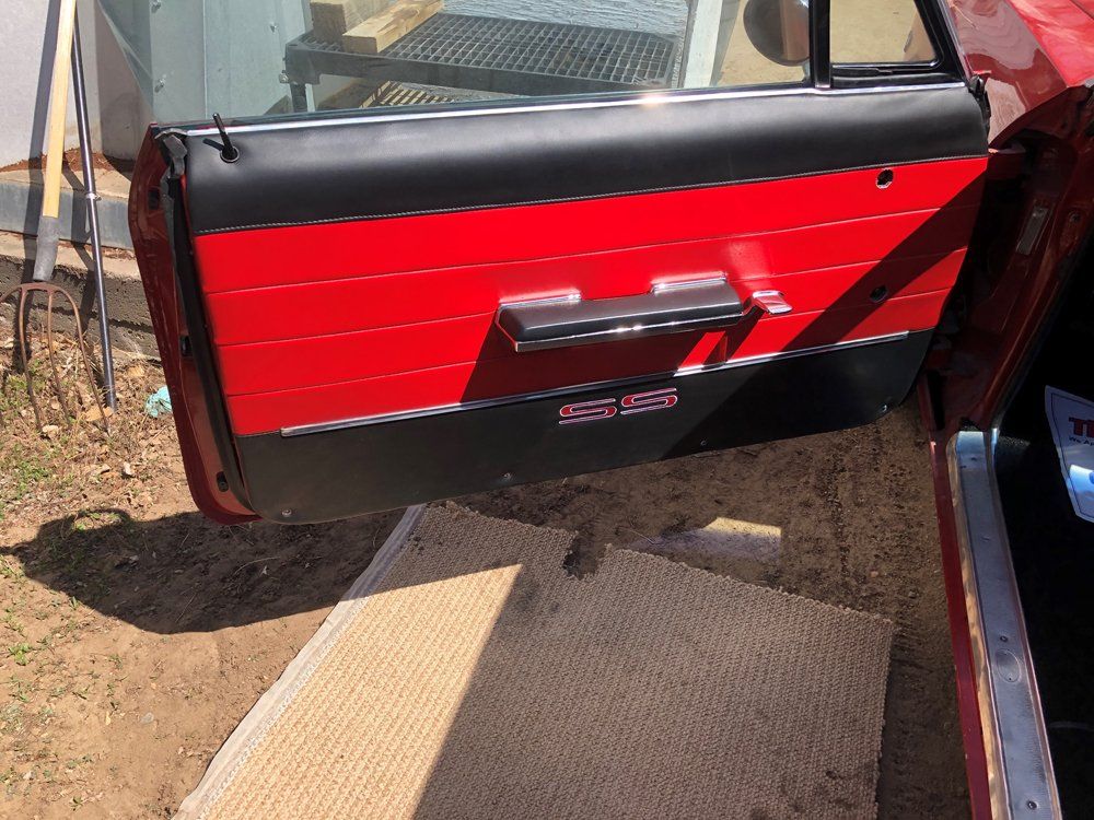 Black and Red Car Door — Windsor, CO — A&F Custom Upholstery