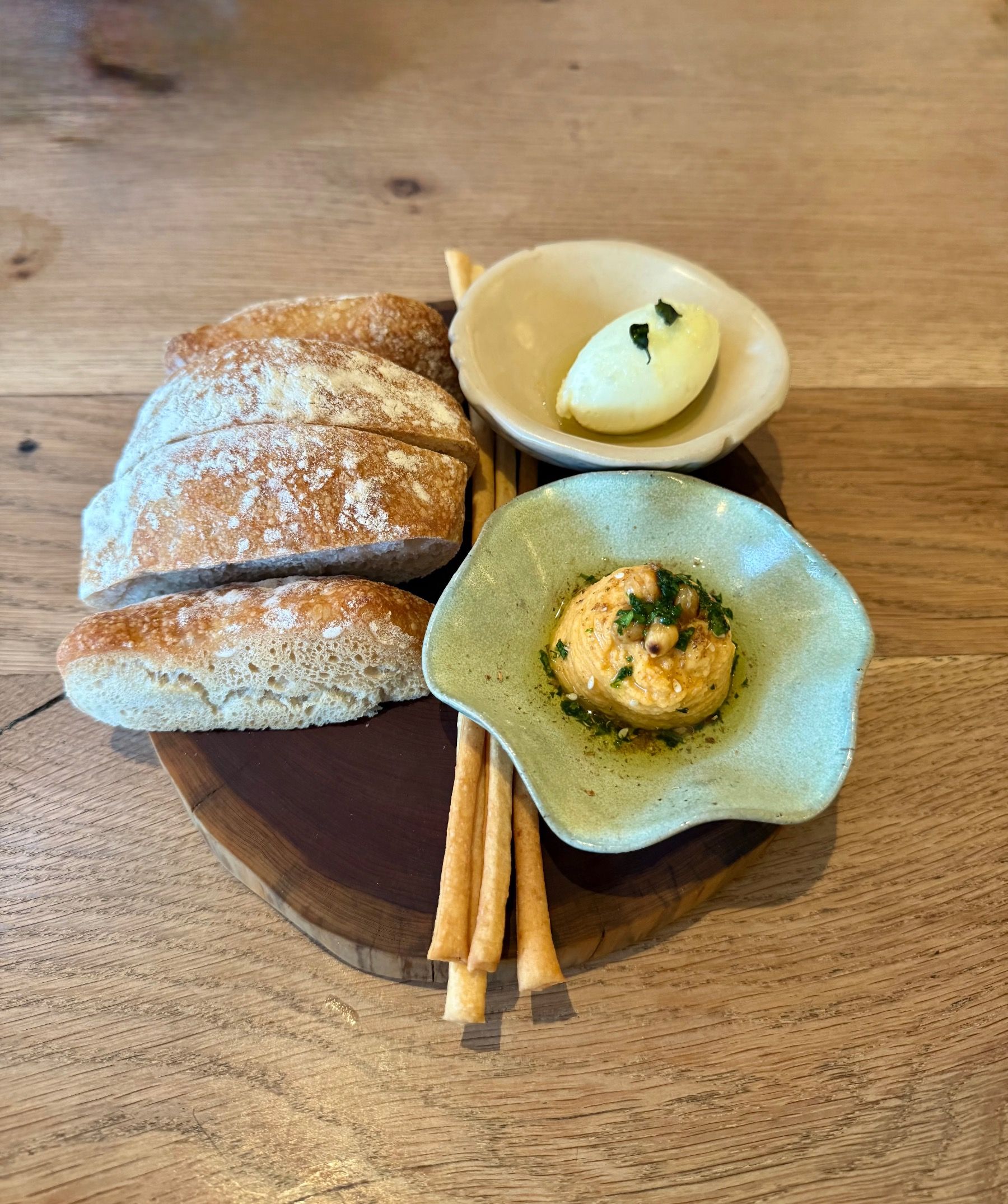 Freshly baked bread with whipped butter and dips at Beyond Stellenbosch
