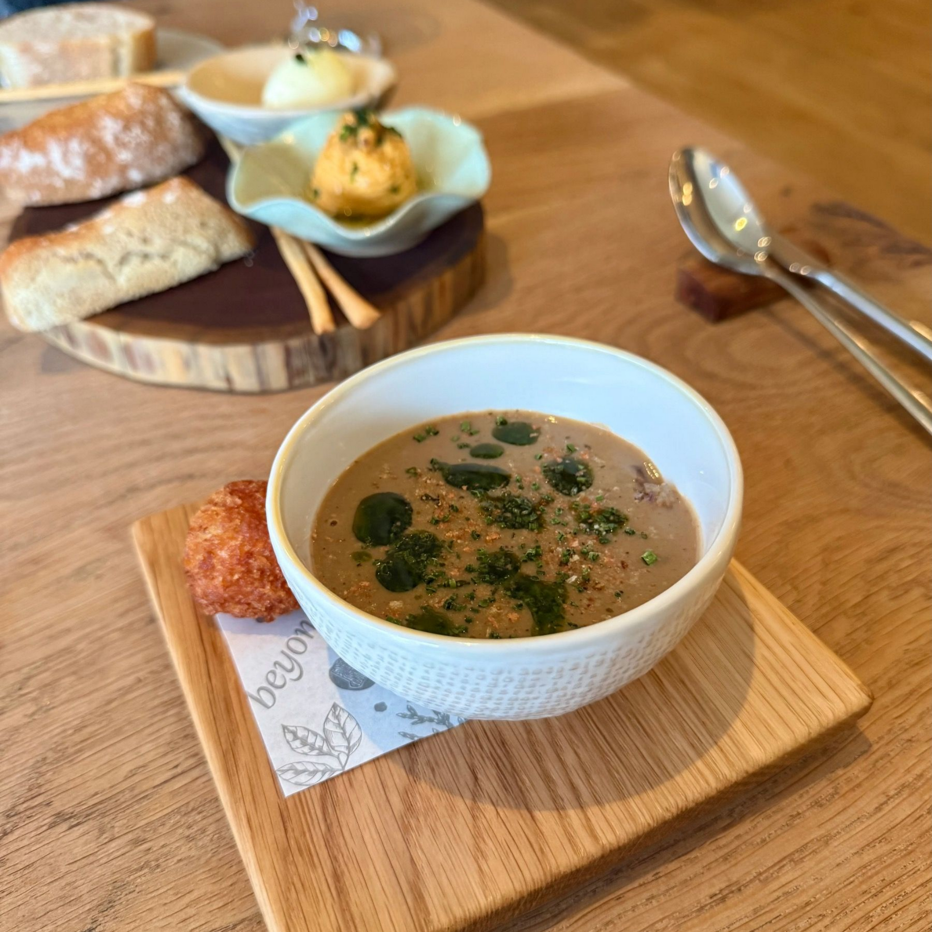 Mushroom soup with truffle arancini at Beyond Restaurant winter menu
