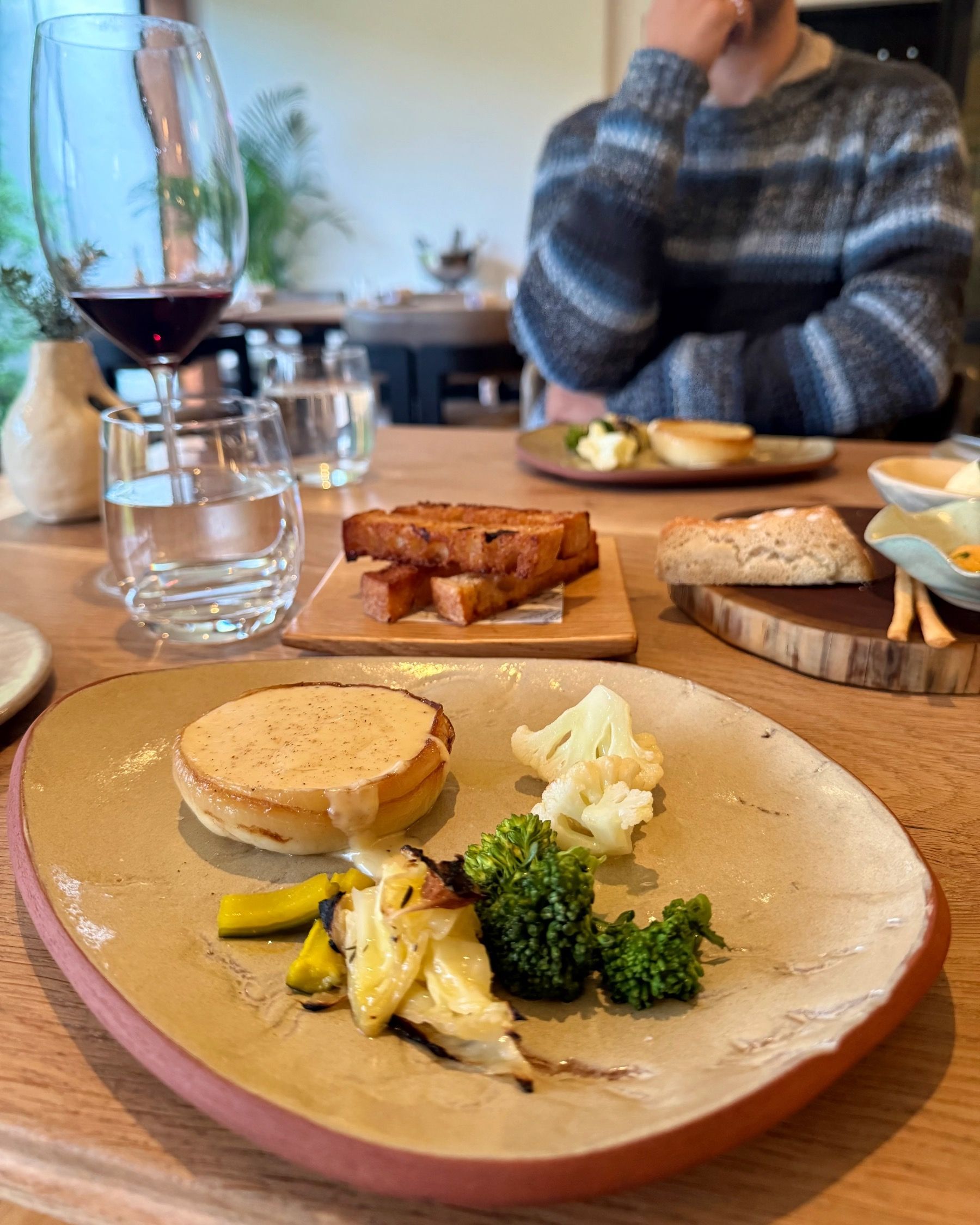 Cheese fondue in baked onion with toasted brioche at Beyond Stellenbosch