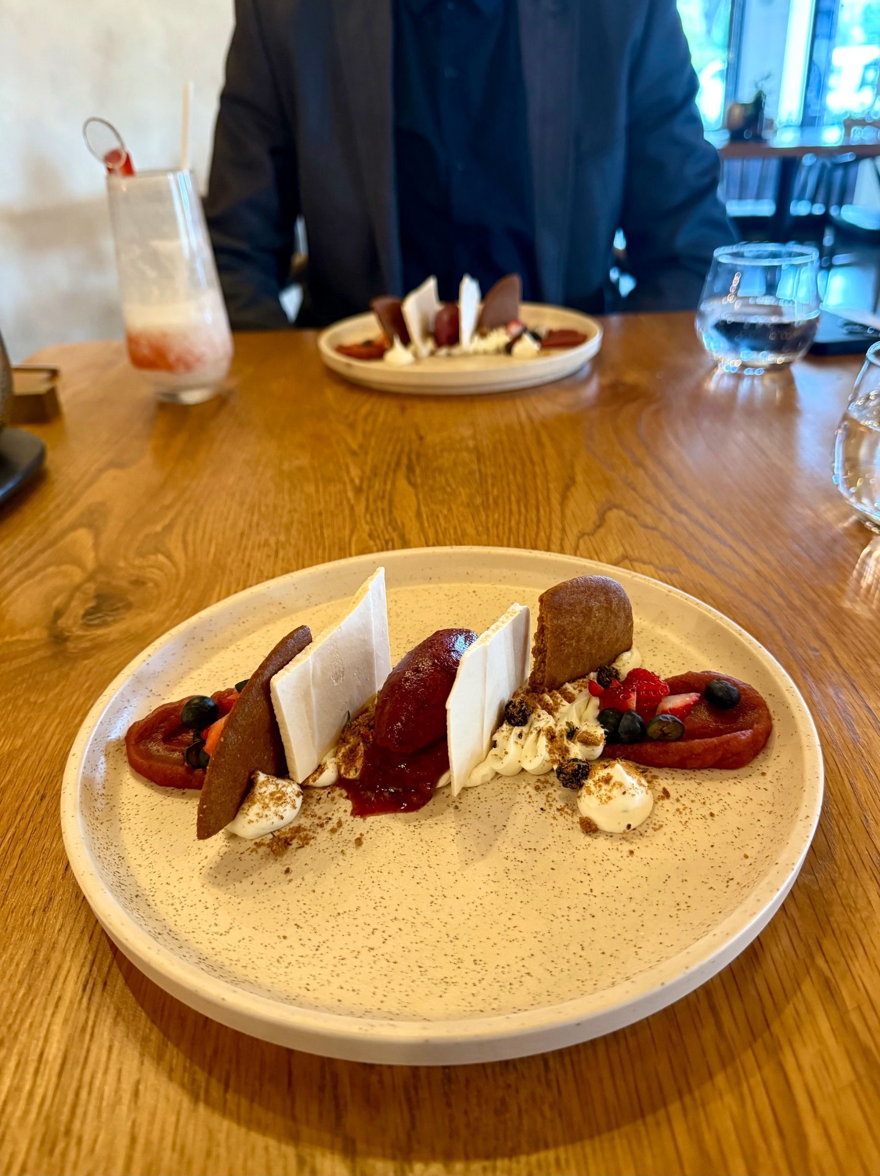 Eton Mess dessert with blueberry ice cream, meringue shards and fresh berries at Eleven Franschhoek
