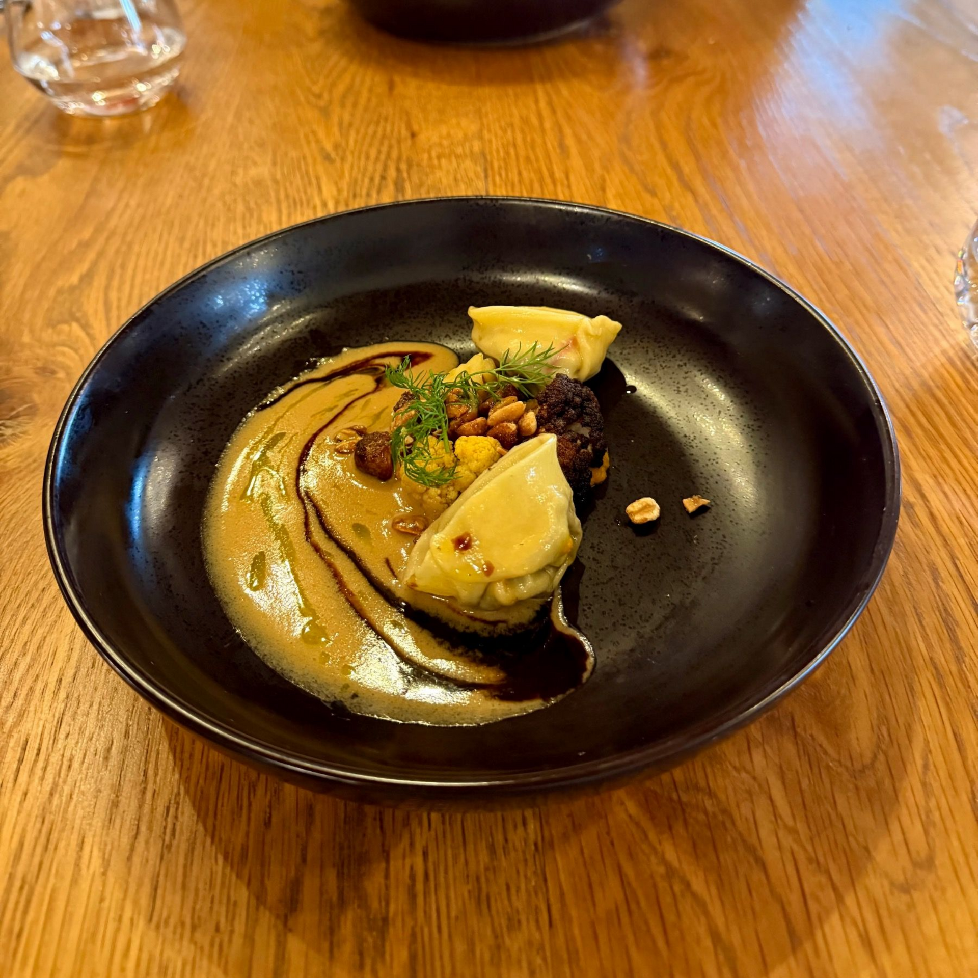 Gemsbok tortellini with miso glaze and candied nuts at Eleven Franschhoek
