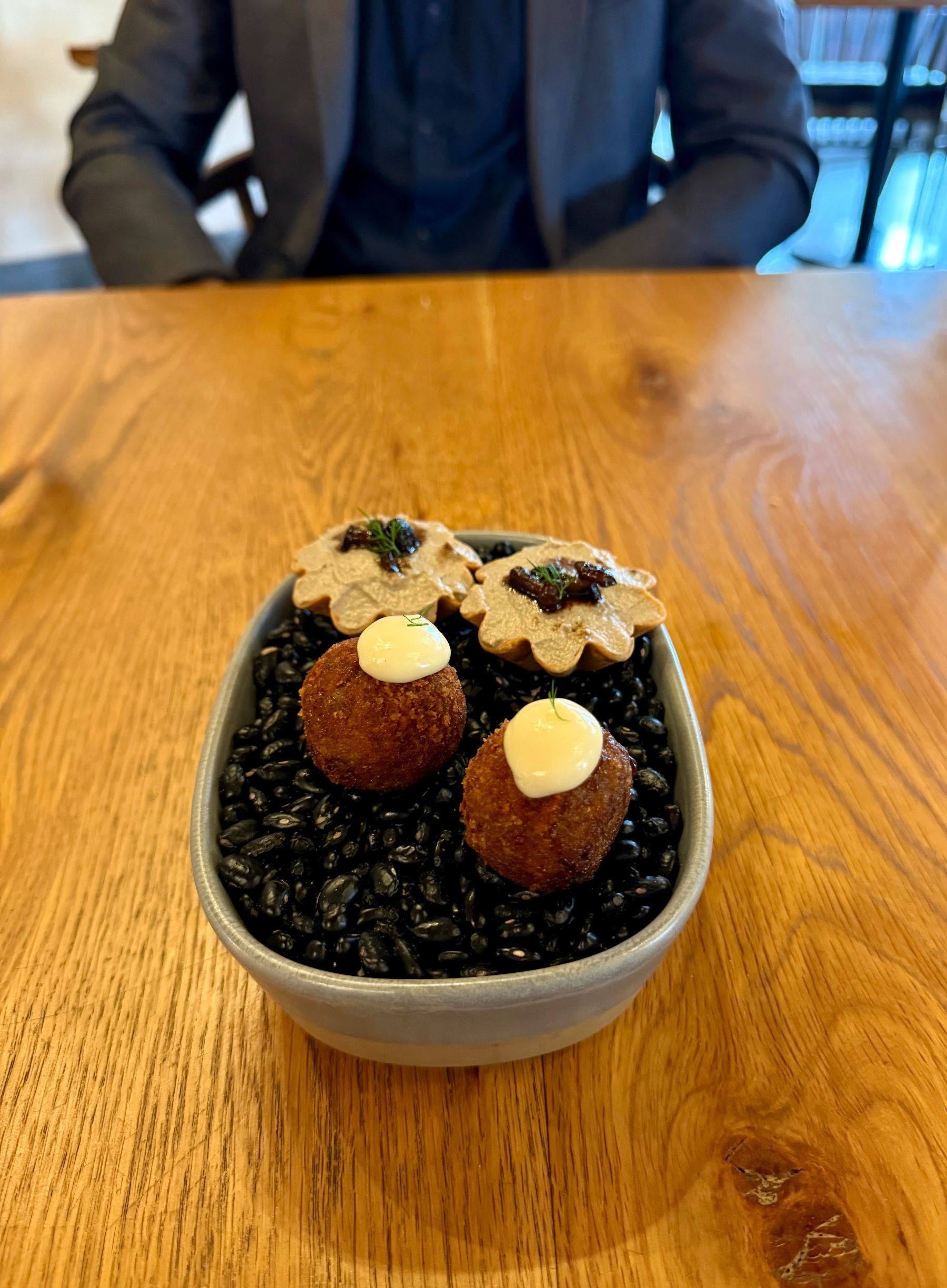 Beef croquette and mushroom tart amuse-bouche at Eleven Franschhoek
