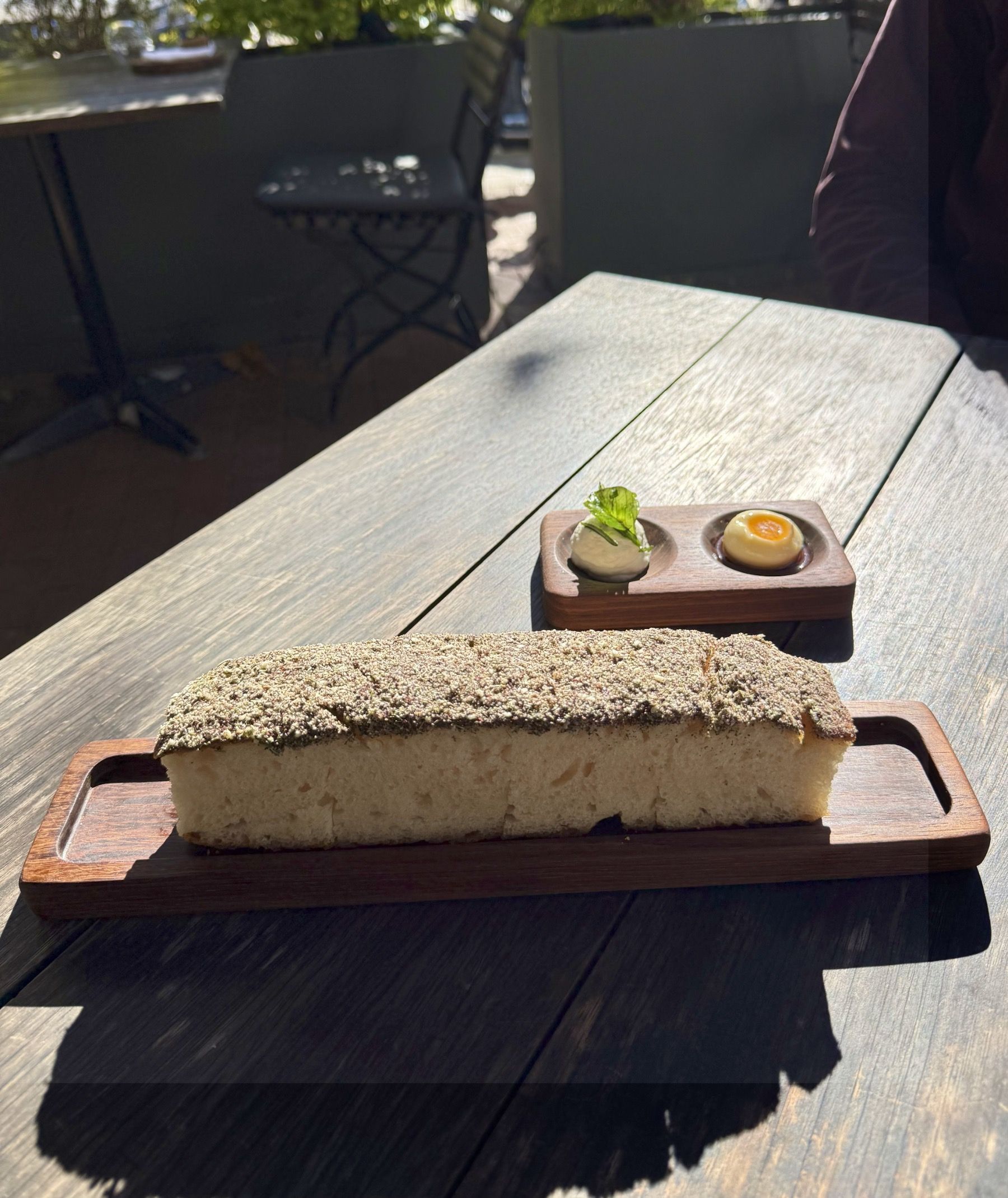 Complimentary focaccia with garlic labneh butter at Foxcroft Constantia