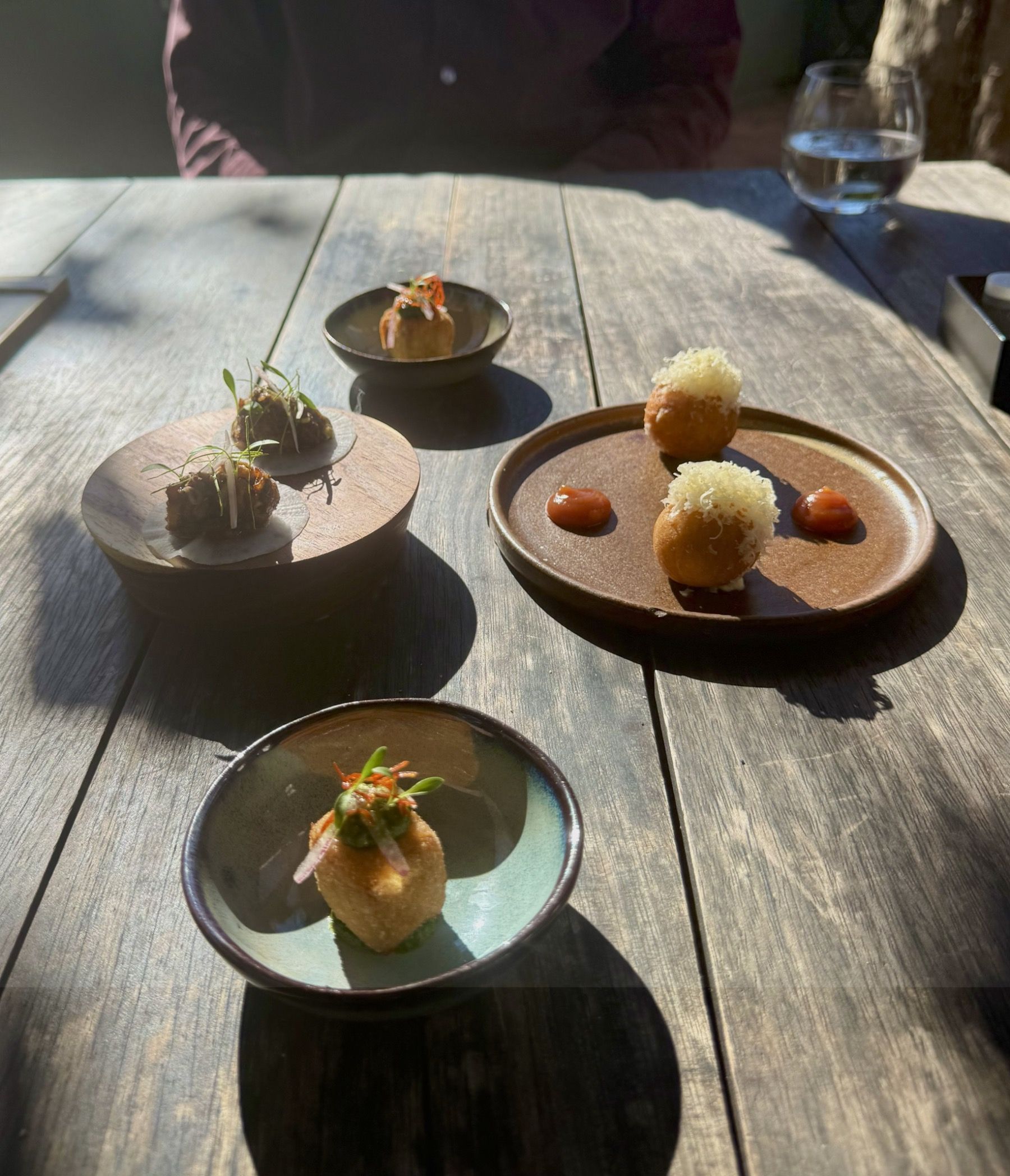 Amuse-bouche trio at Foxcroft Constantia including duck croquette, aubergine taco
