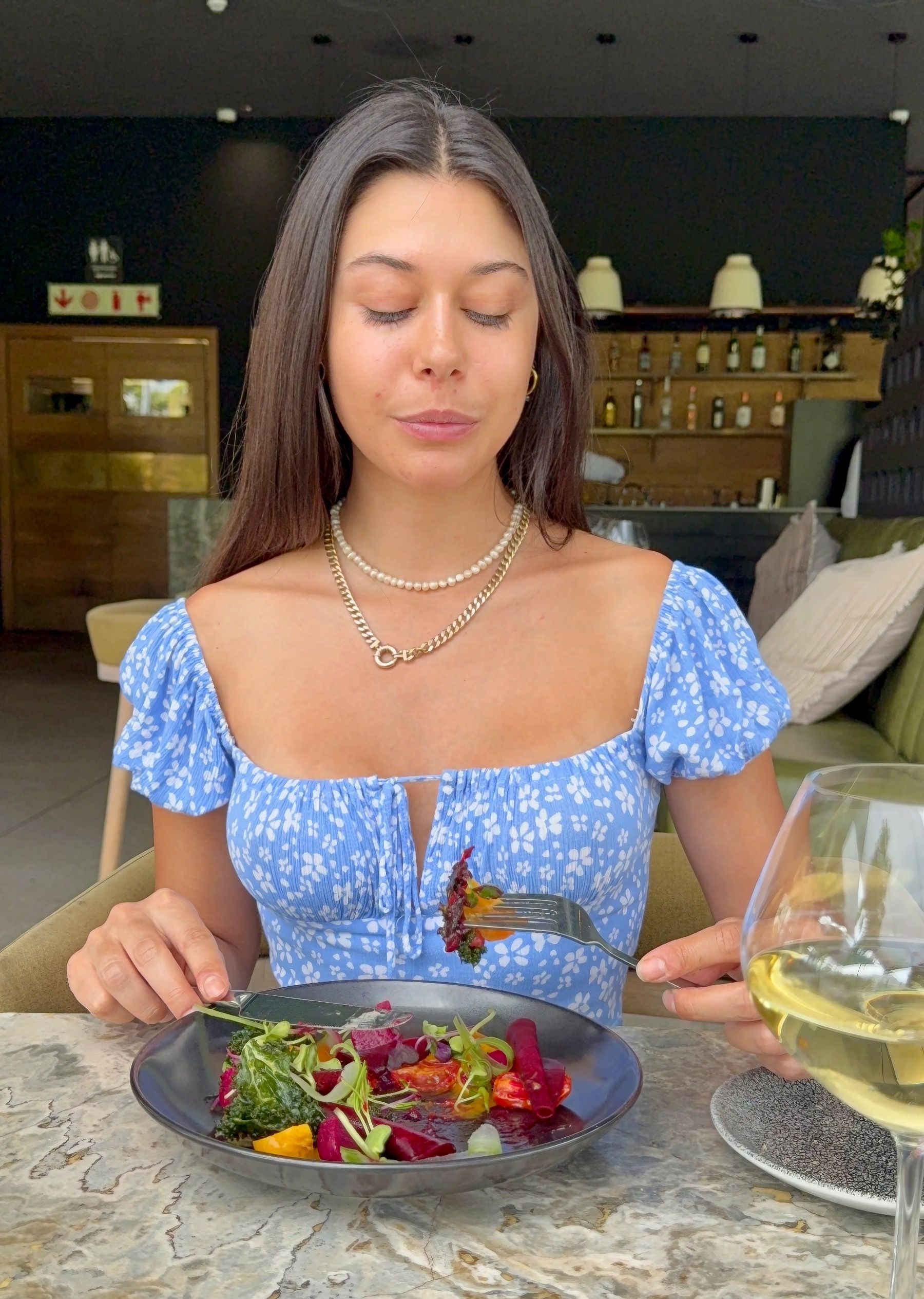 Paige Ellis Green enjoying the heirloom tomato and summer beet salad on the Grub & Vine Norval terrace