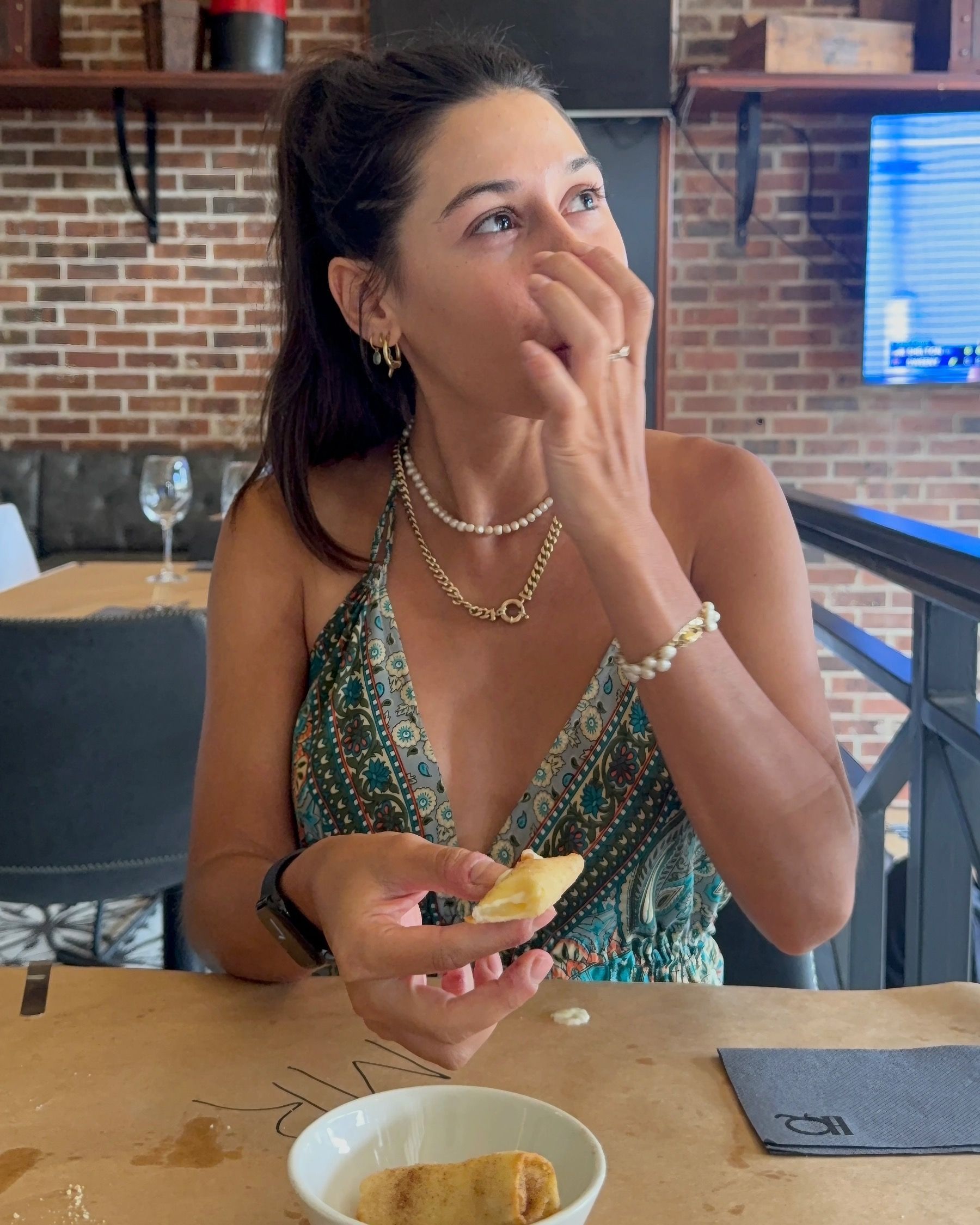 Paige enjoying the milk tart pastry parcels at HQ Steakhouse in Century City