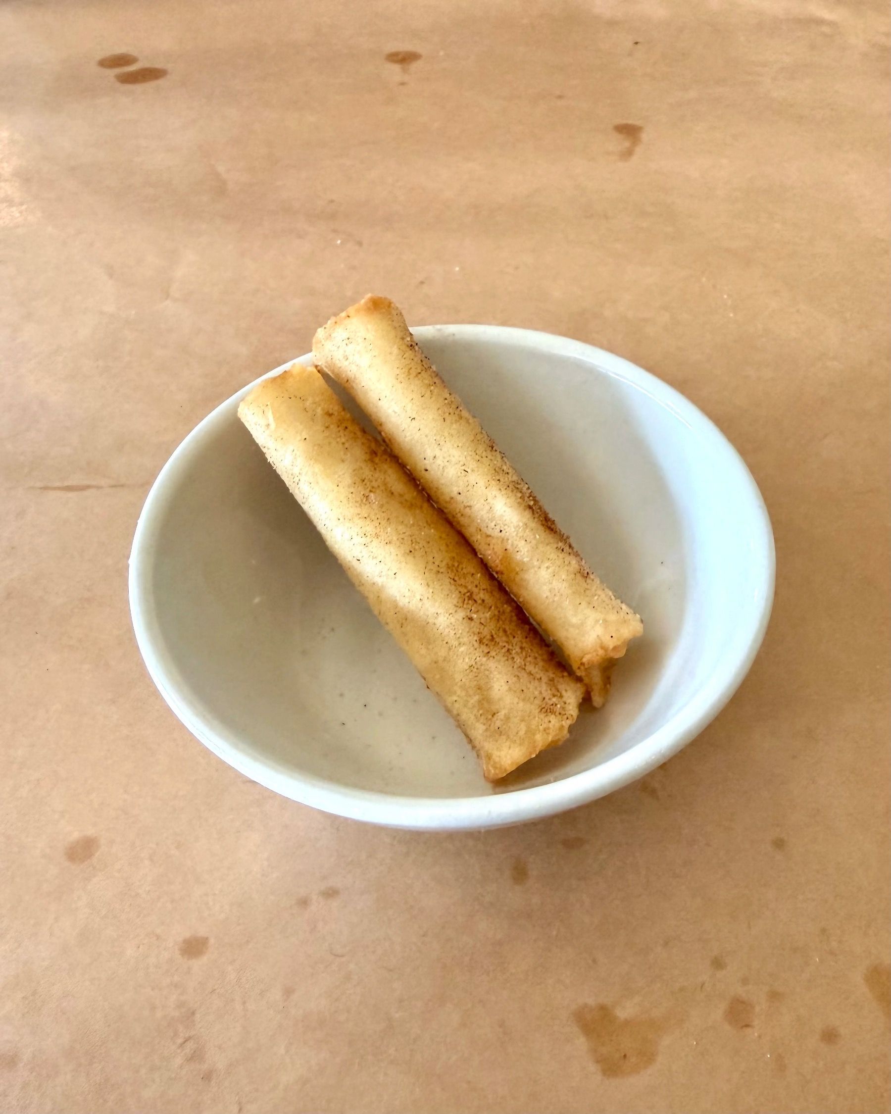 Milk tart pastry parcels at HQ Steakhouse, crisp golden layers filled with creamy South African milk tart custard