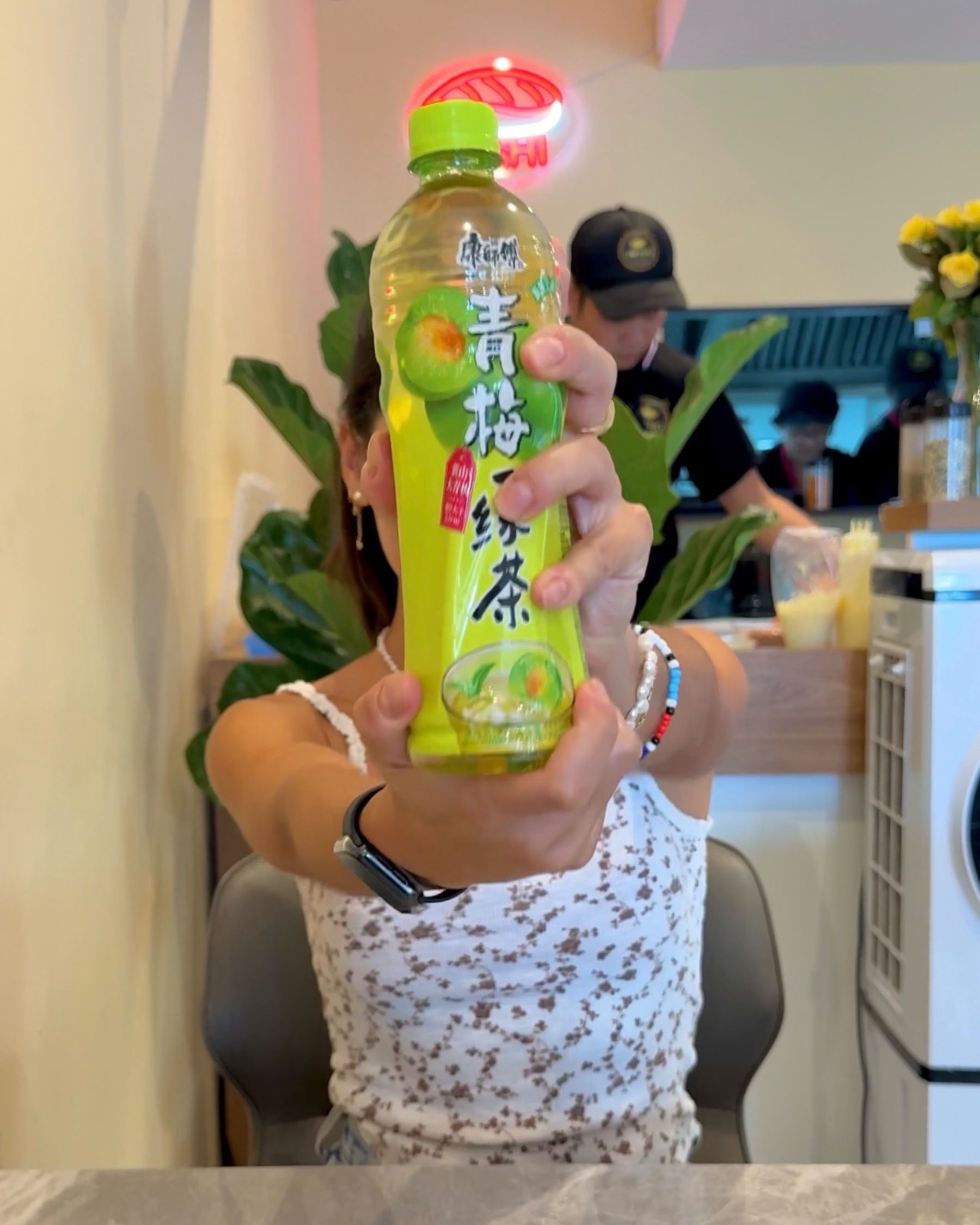 Paige holding drink at I Love Pho