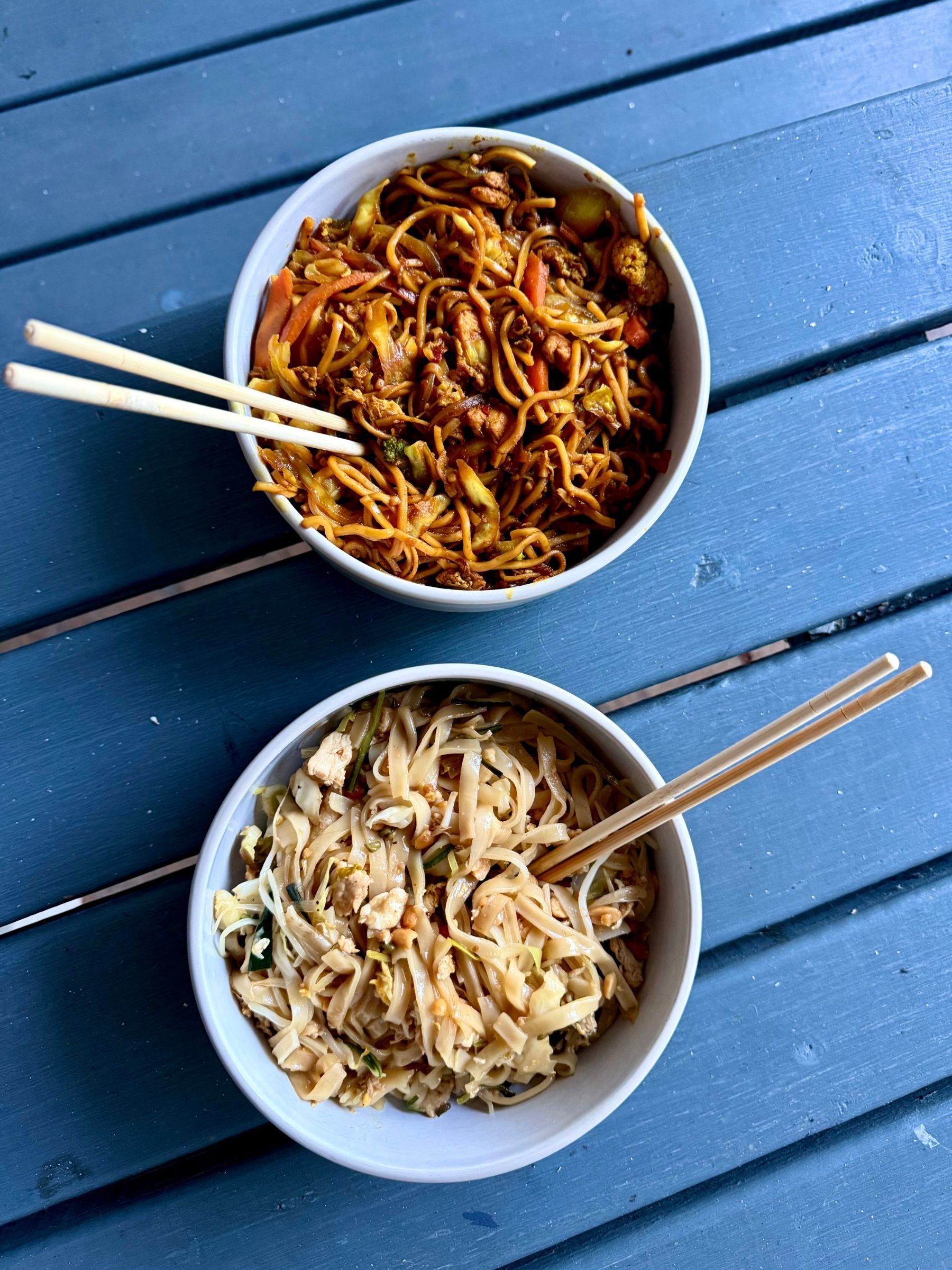 Khom Hom Thai dishes including Phad Thai, phad prik phao
