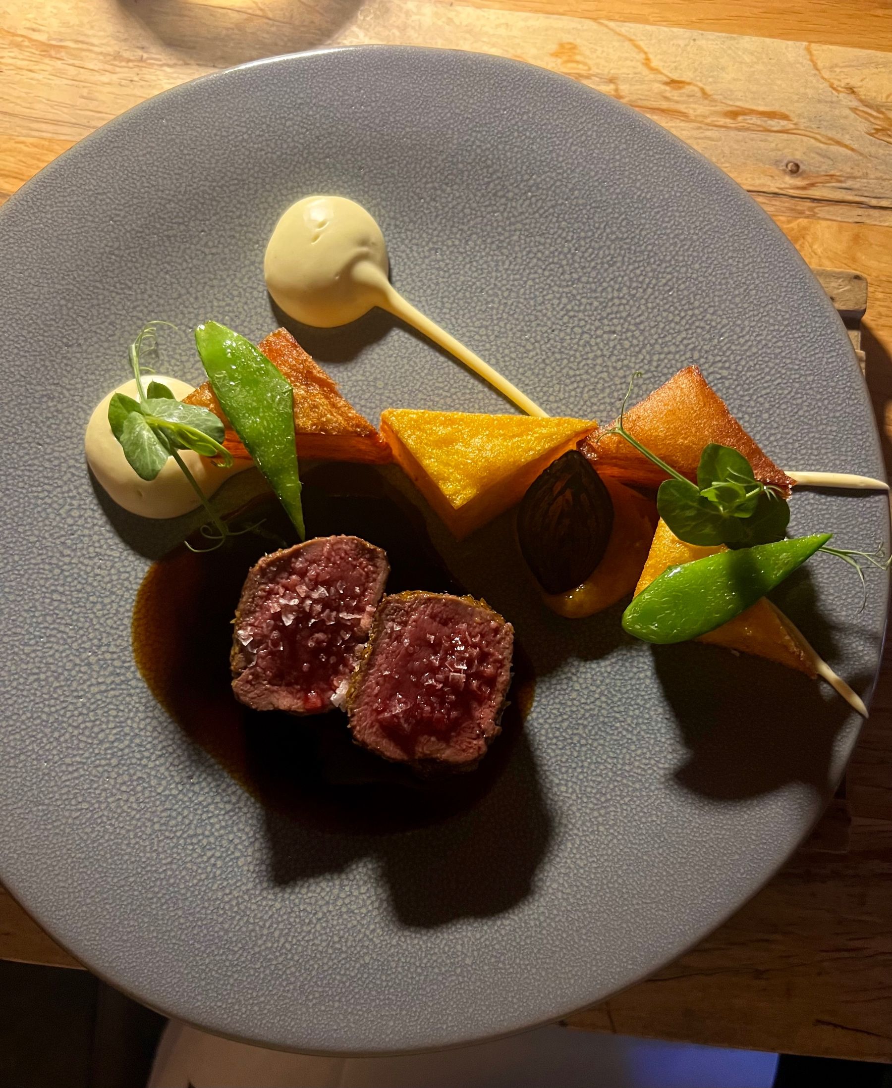 Homespun kudu main course with potatoes and garnish

