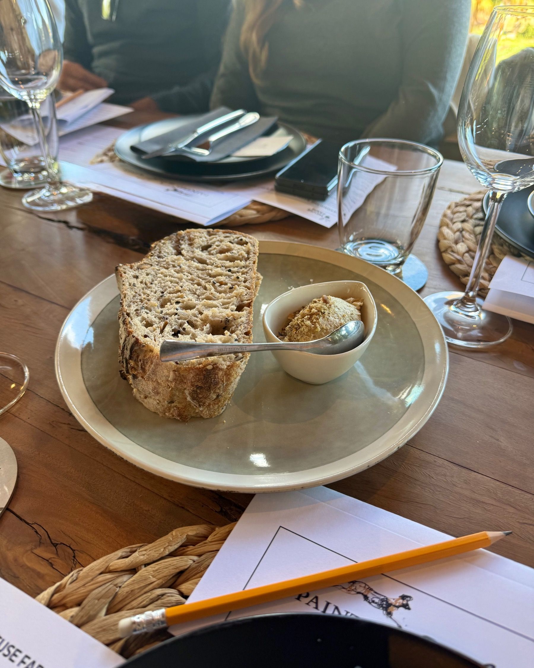 Warm farm style bread with creamy butter and smoked yellowtail pate served at Meuse Farm wine dinner