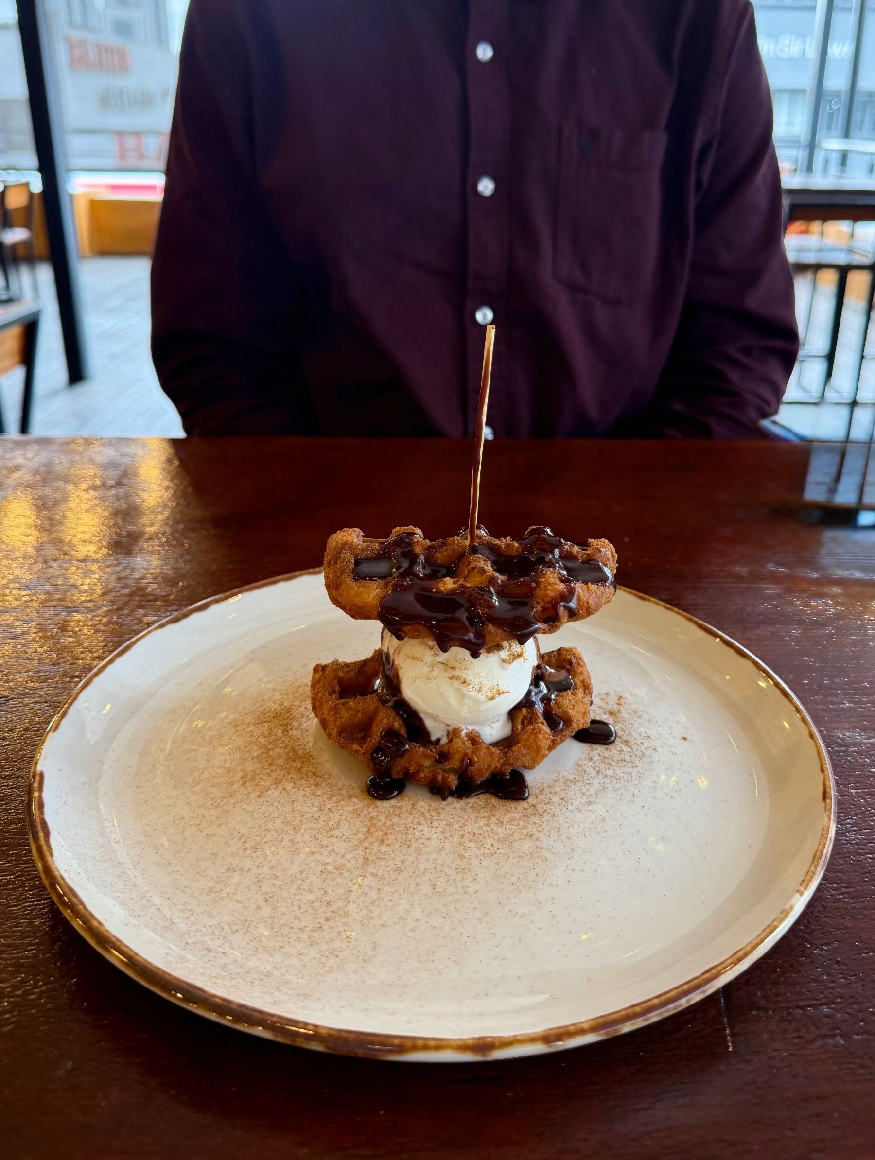 Churro waffle with chocolate sauce at Mexicola Locale
