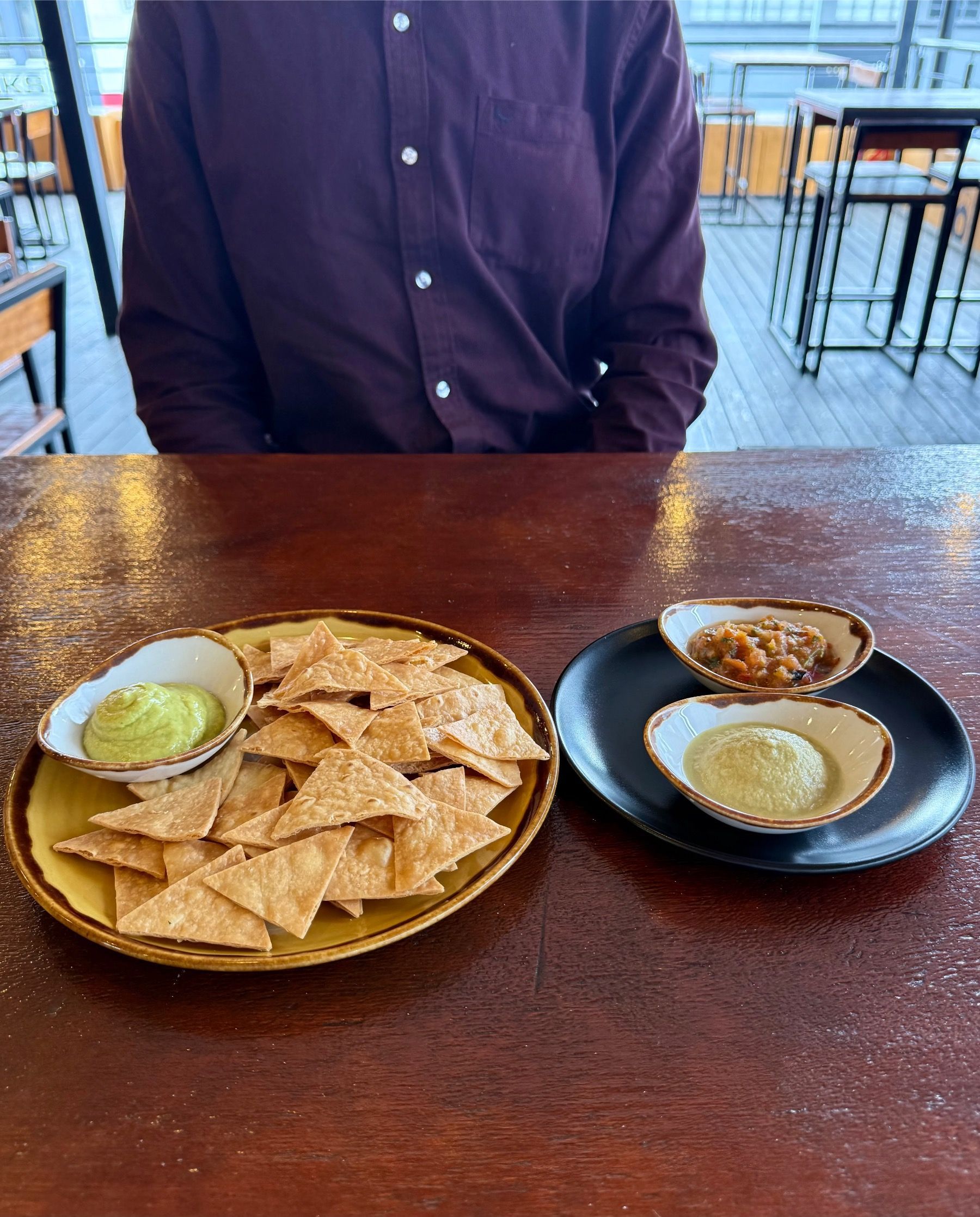 Guacamole, jalapeño olive dip and salsa with tortilla chips
