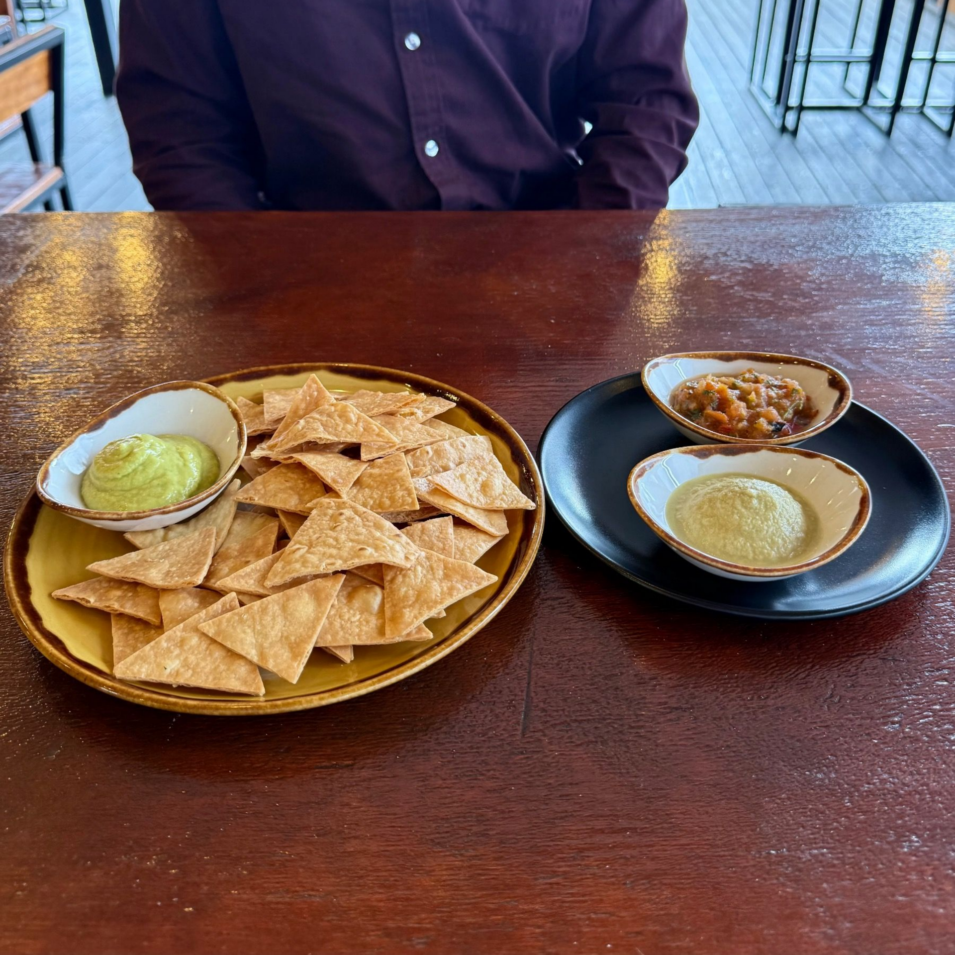 Guacamole, jalapeño olive dip and salsa with tortilla chips
