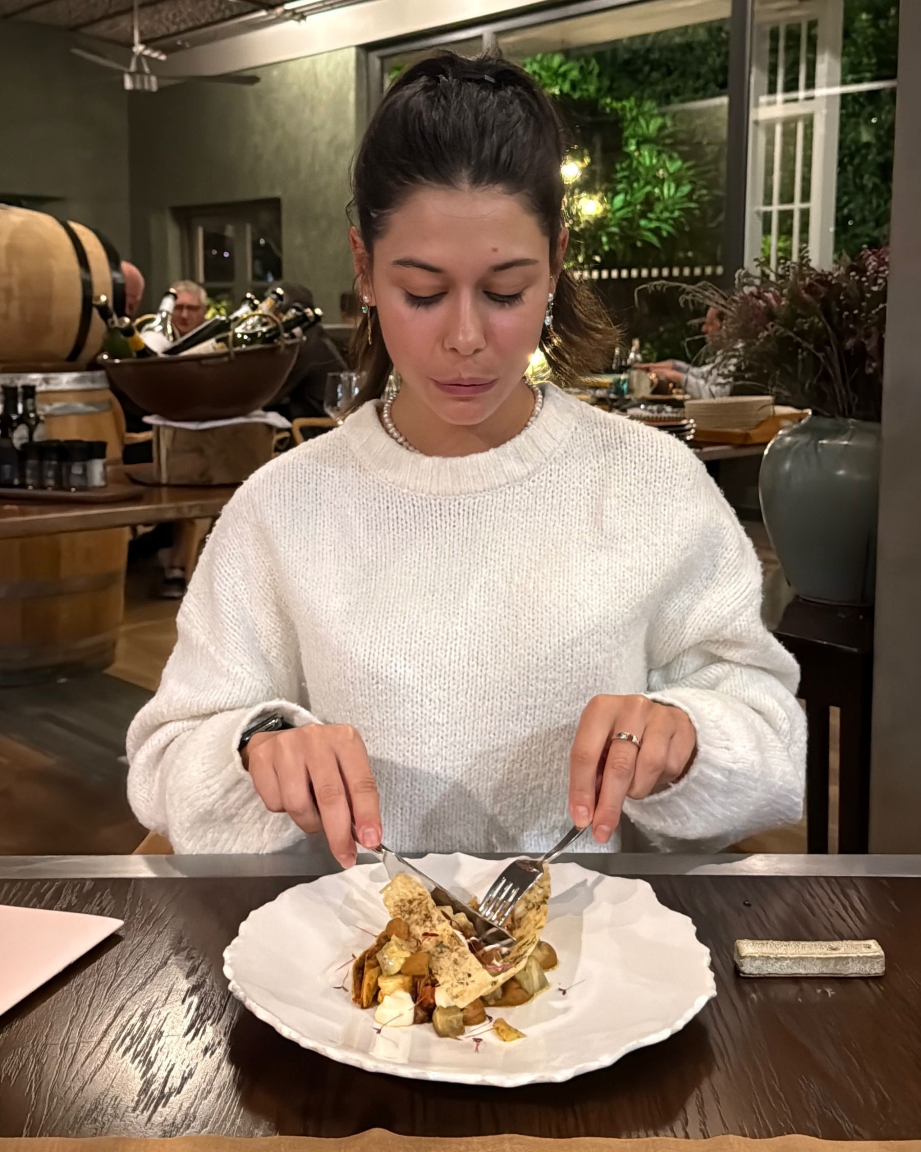 Paige is about to eat a kombini sando at Ramenhead Cape Town
