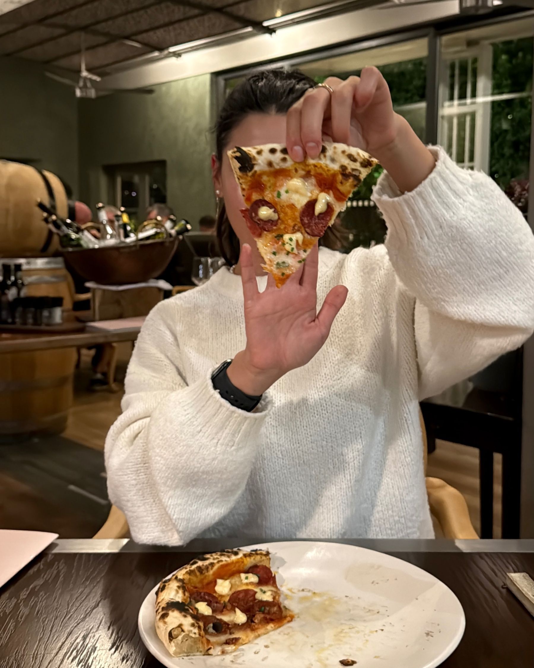 Paige is smelling ramen at Ramenhead Cape Town