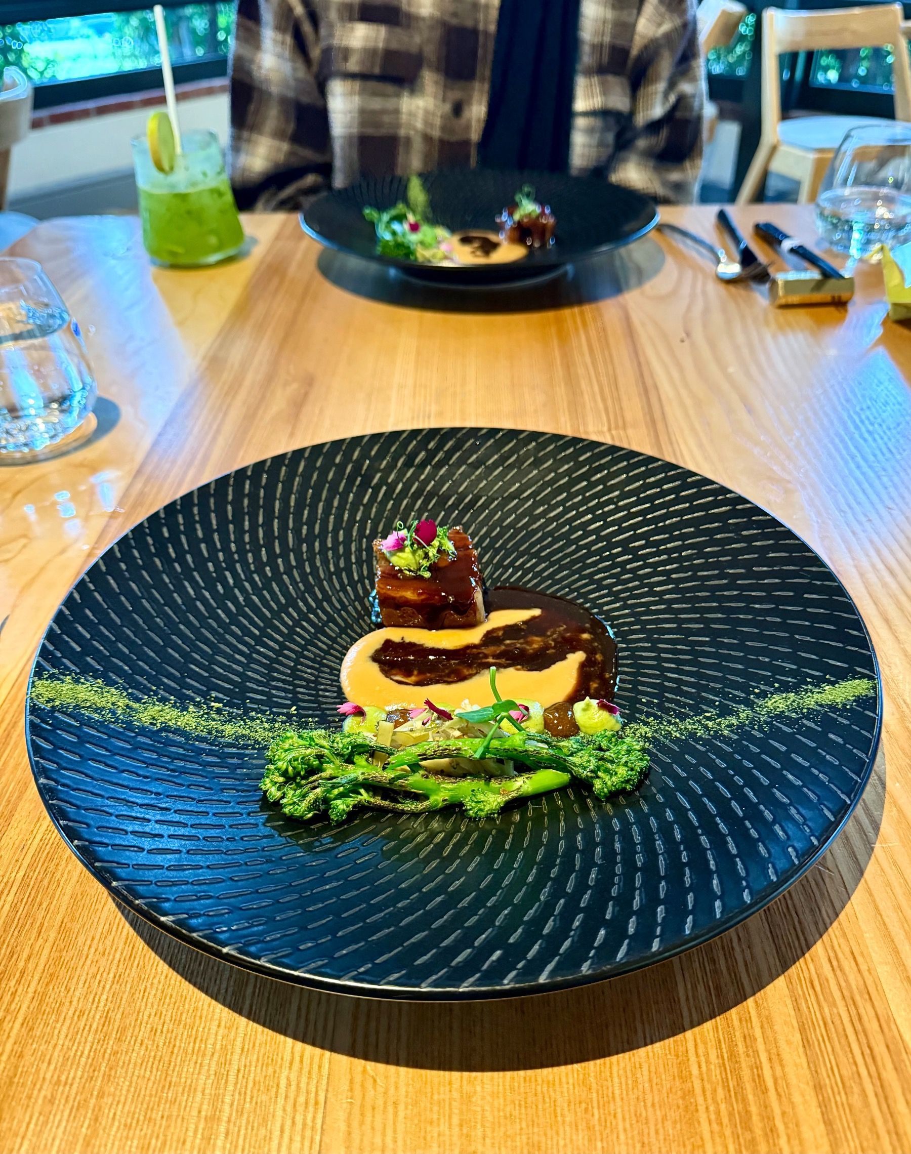 Signature lamb main with jus and seasonal garnish in elegant Kaiseki style.
