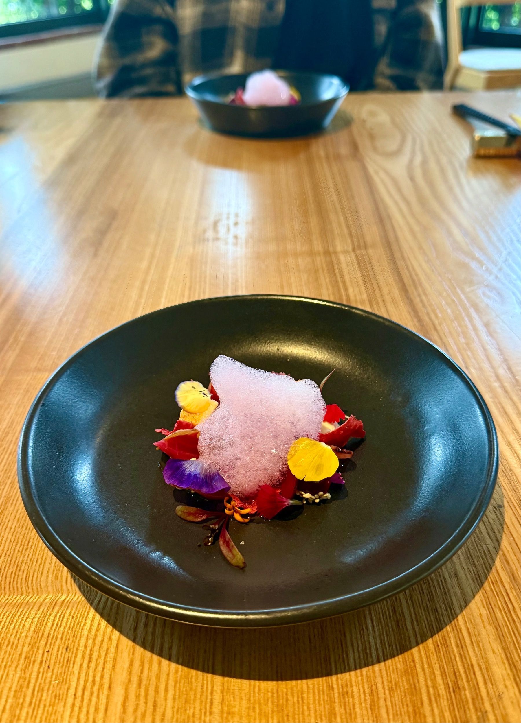 Beetroot dish with vibrant garnish presented in refined Japanese style.
