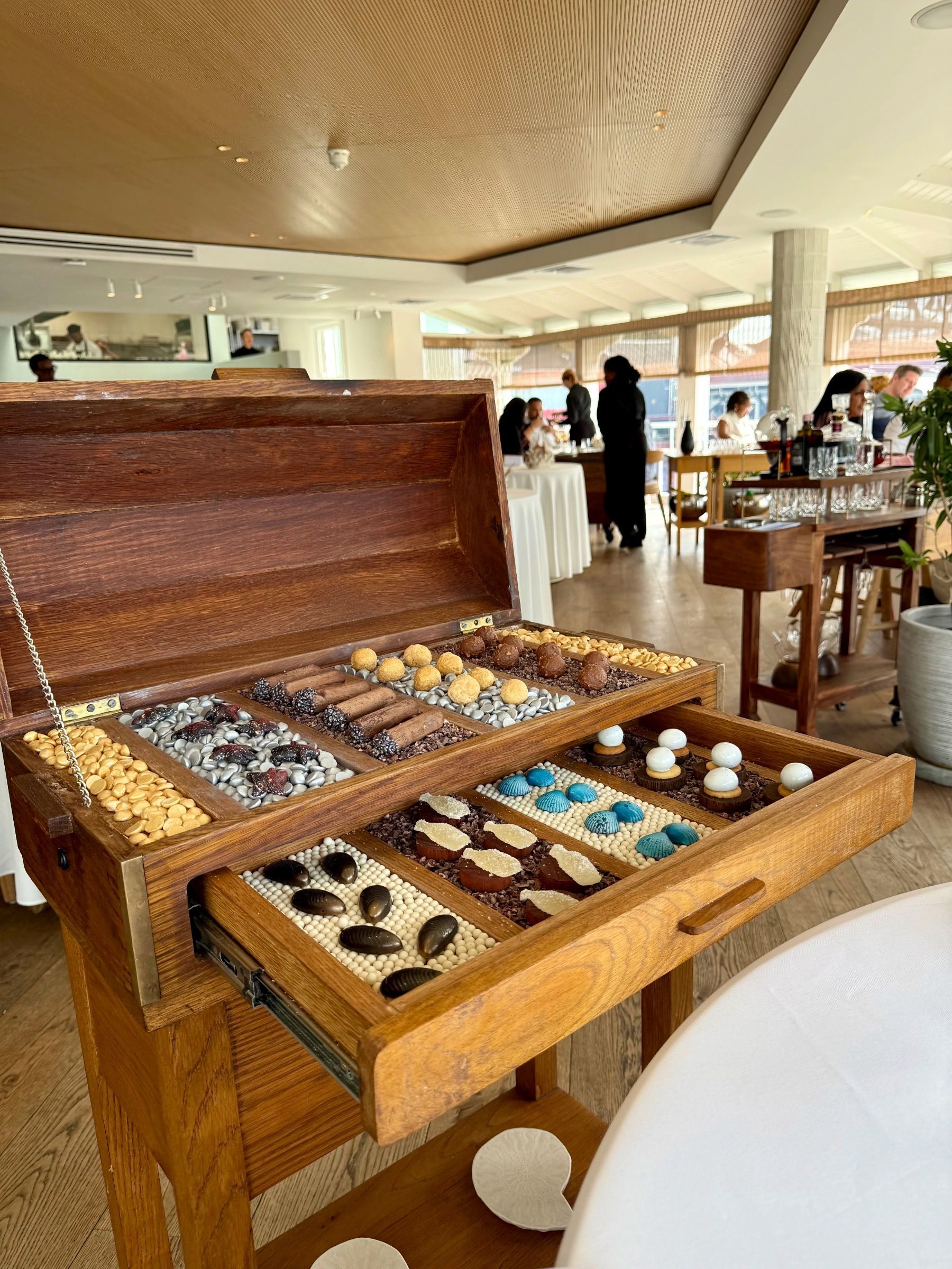 Petit four chest presentation at Pier Restaurant Cape Town
