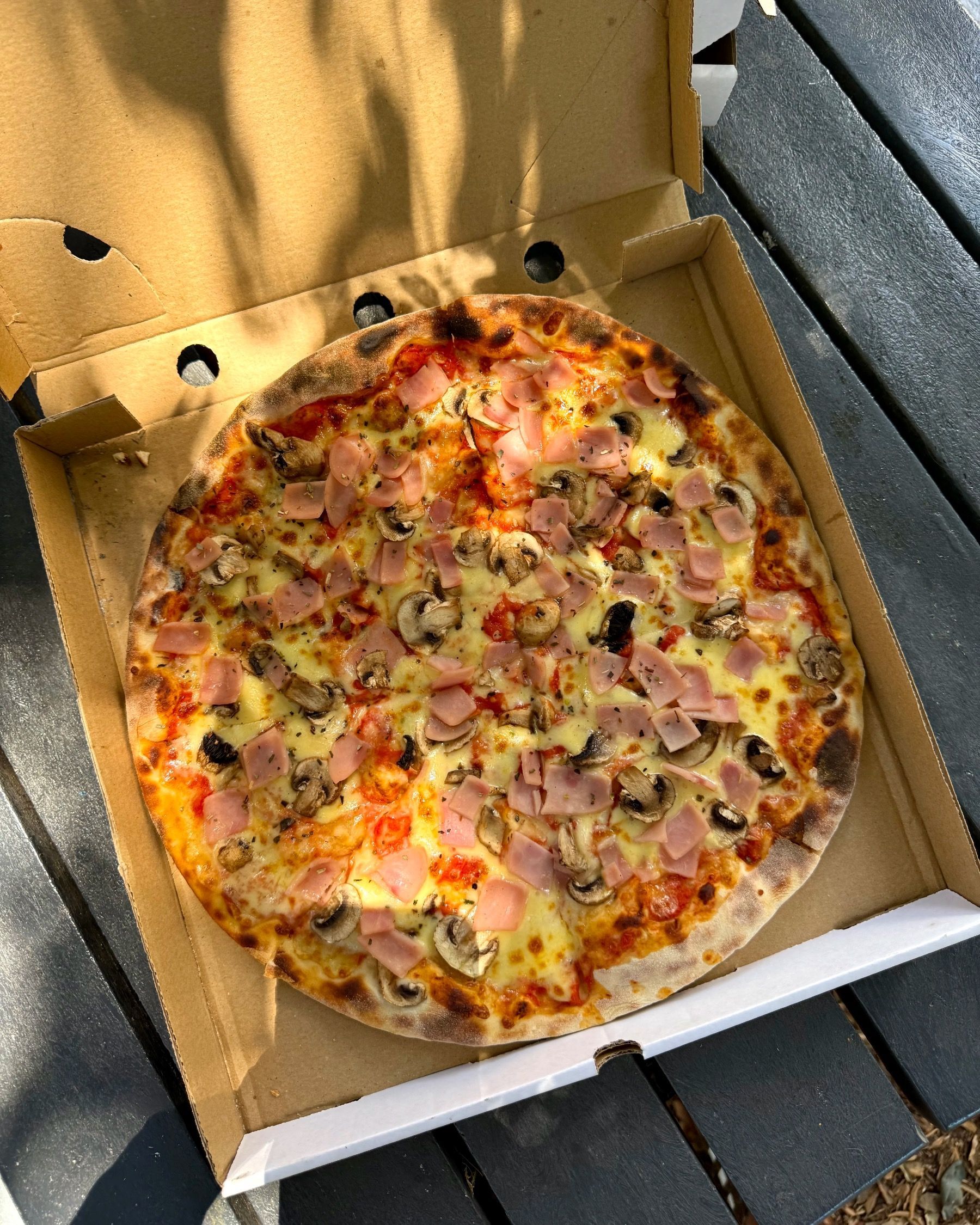 Regina pizza with ham, mushrooms and mozzarella from Piccolo Posticino Rondebosch