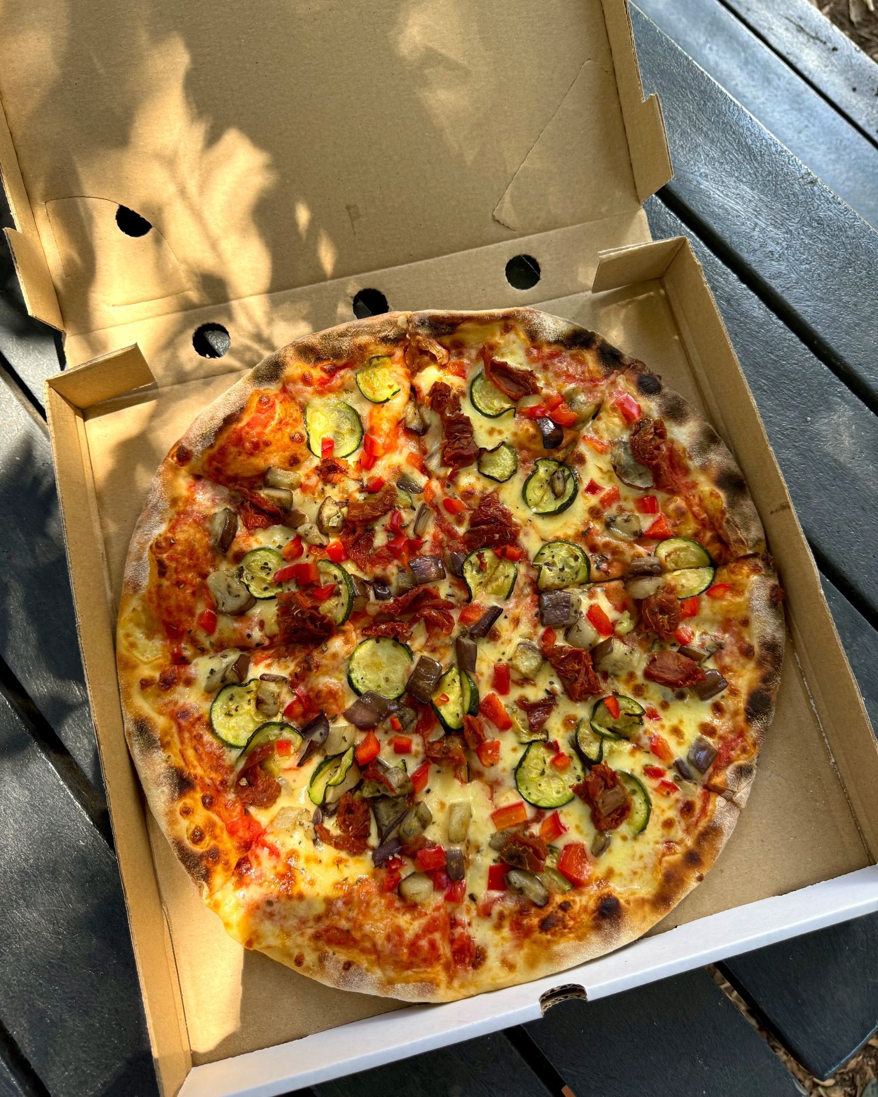 Full Contadina pizza with sun dried tomato, zucchini, peppers, eggplant from Piccolo Posticino Rondebosch
