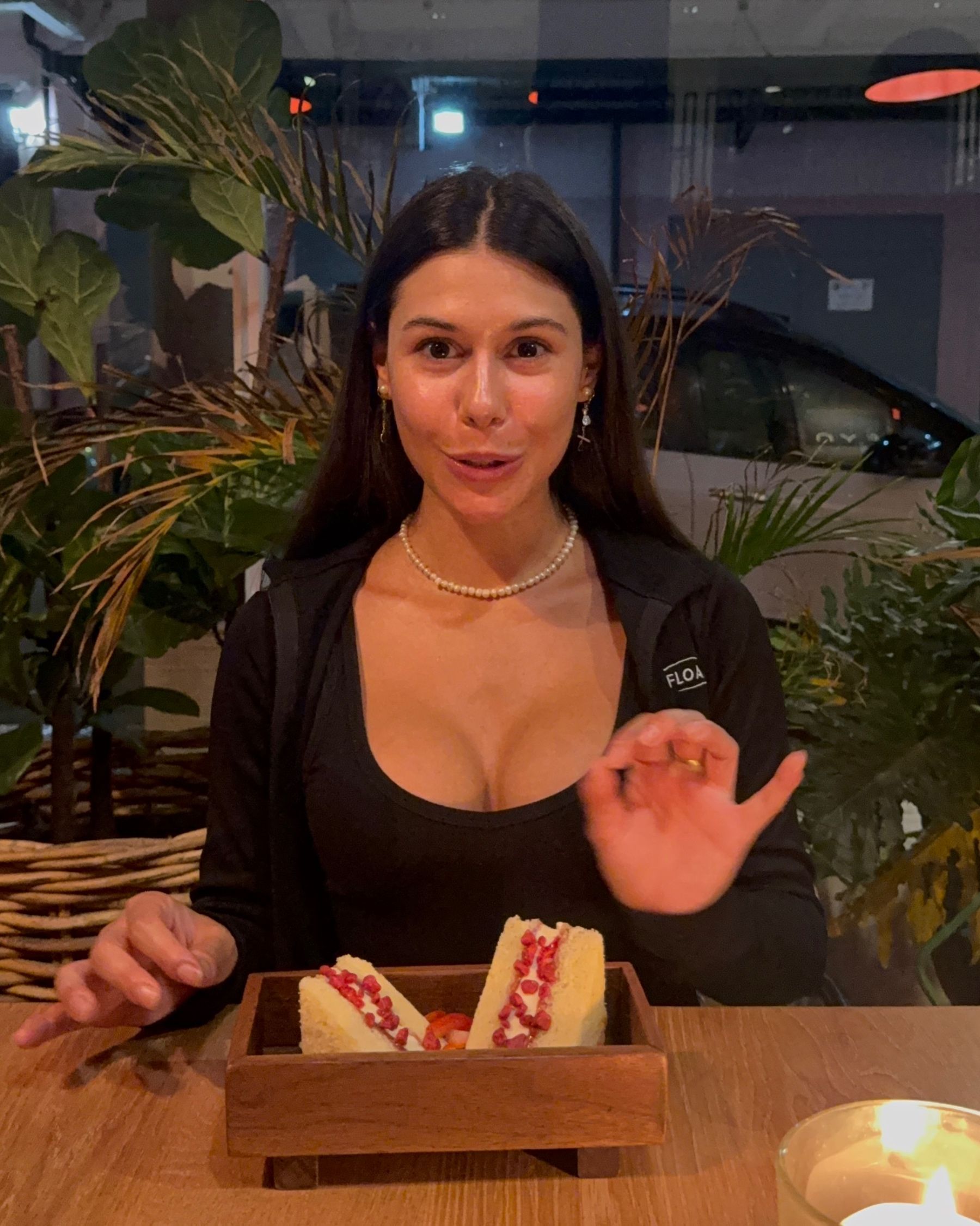 Paige is about to eat a kombini sando at Ramenhead Cape Town
