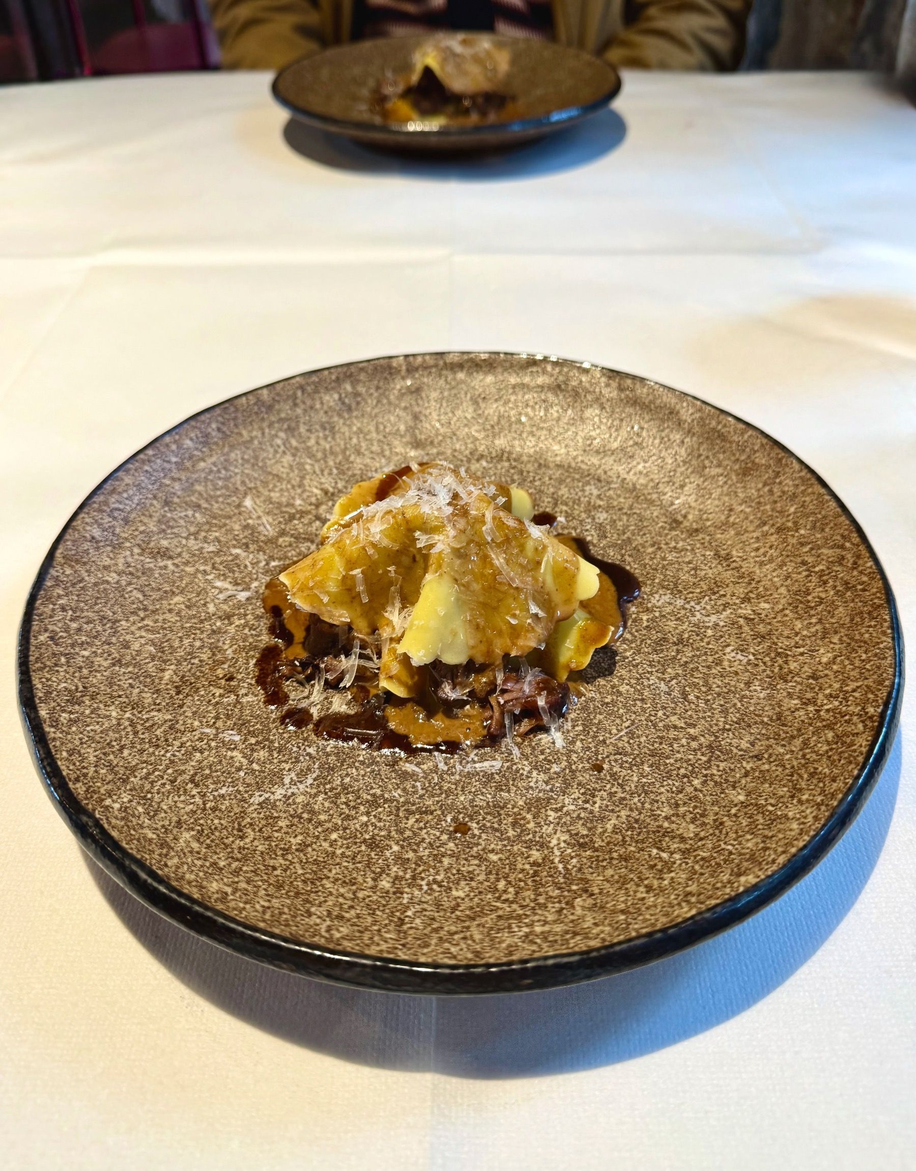 Rich oxtail pasta with parmesan and herbs at The Test Kitchen