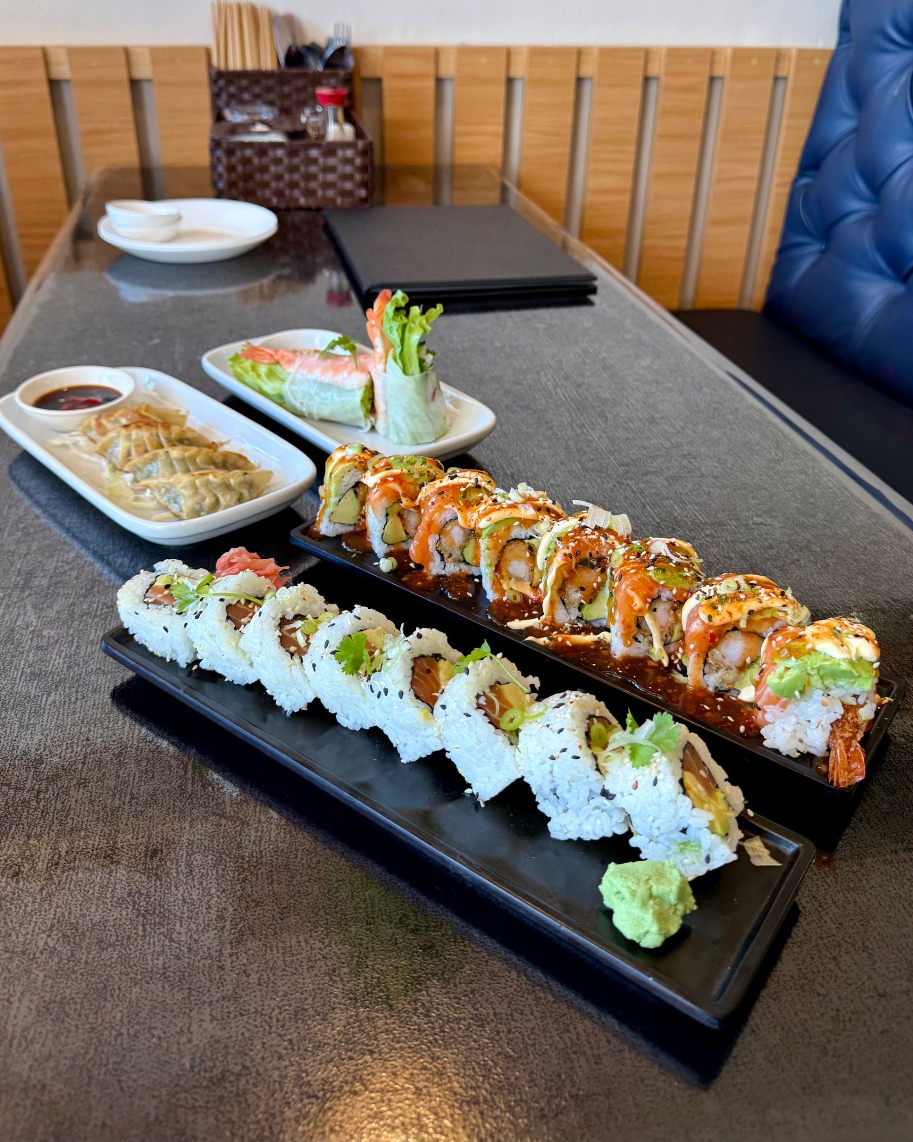 Starters at Vietnamese Street Kitchen including sushi, pork wontons and fresh prawn spring rolls
