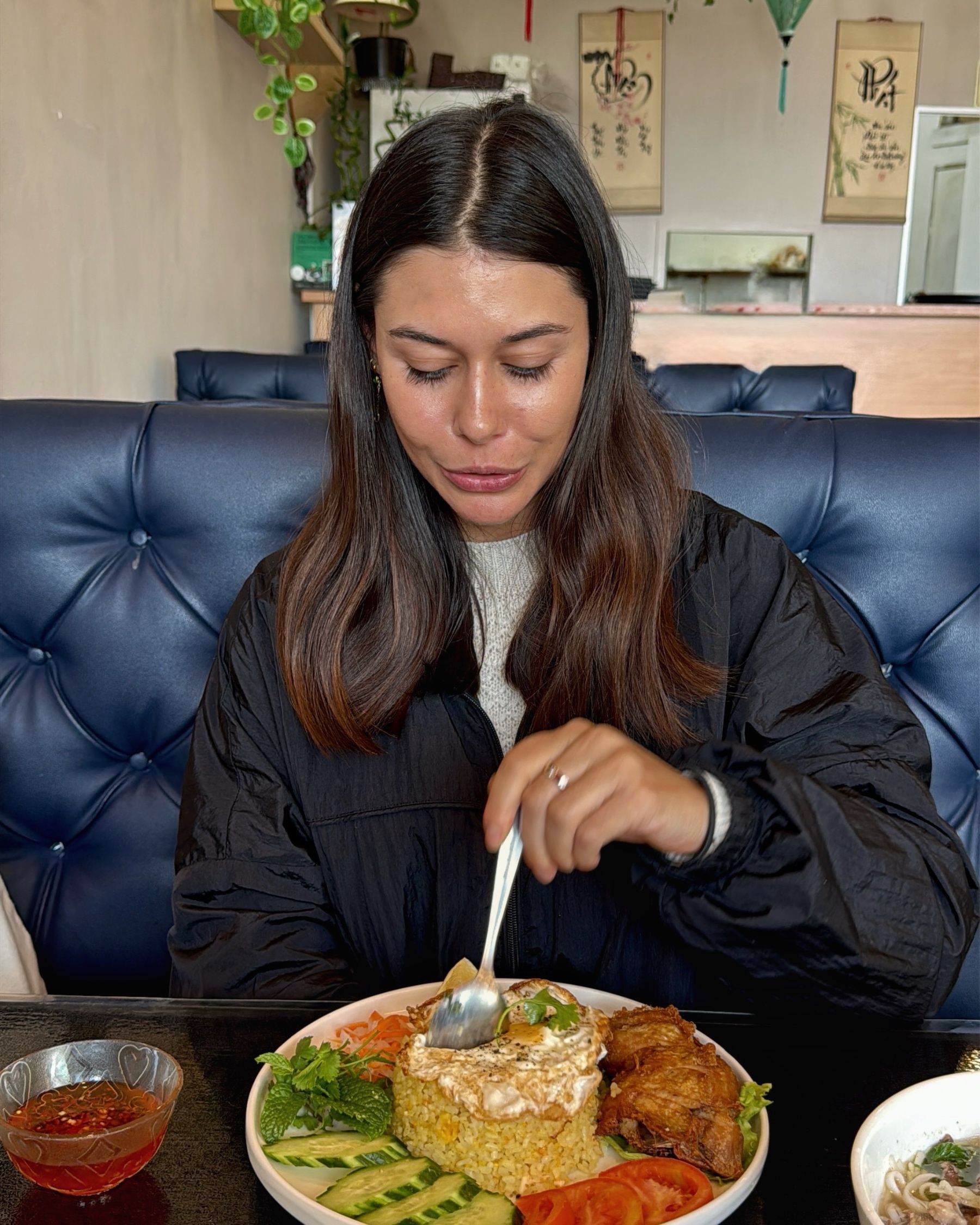 Paige eating Com Ga at Vietnamese Street Kitchen