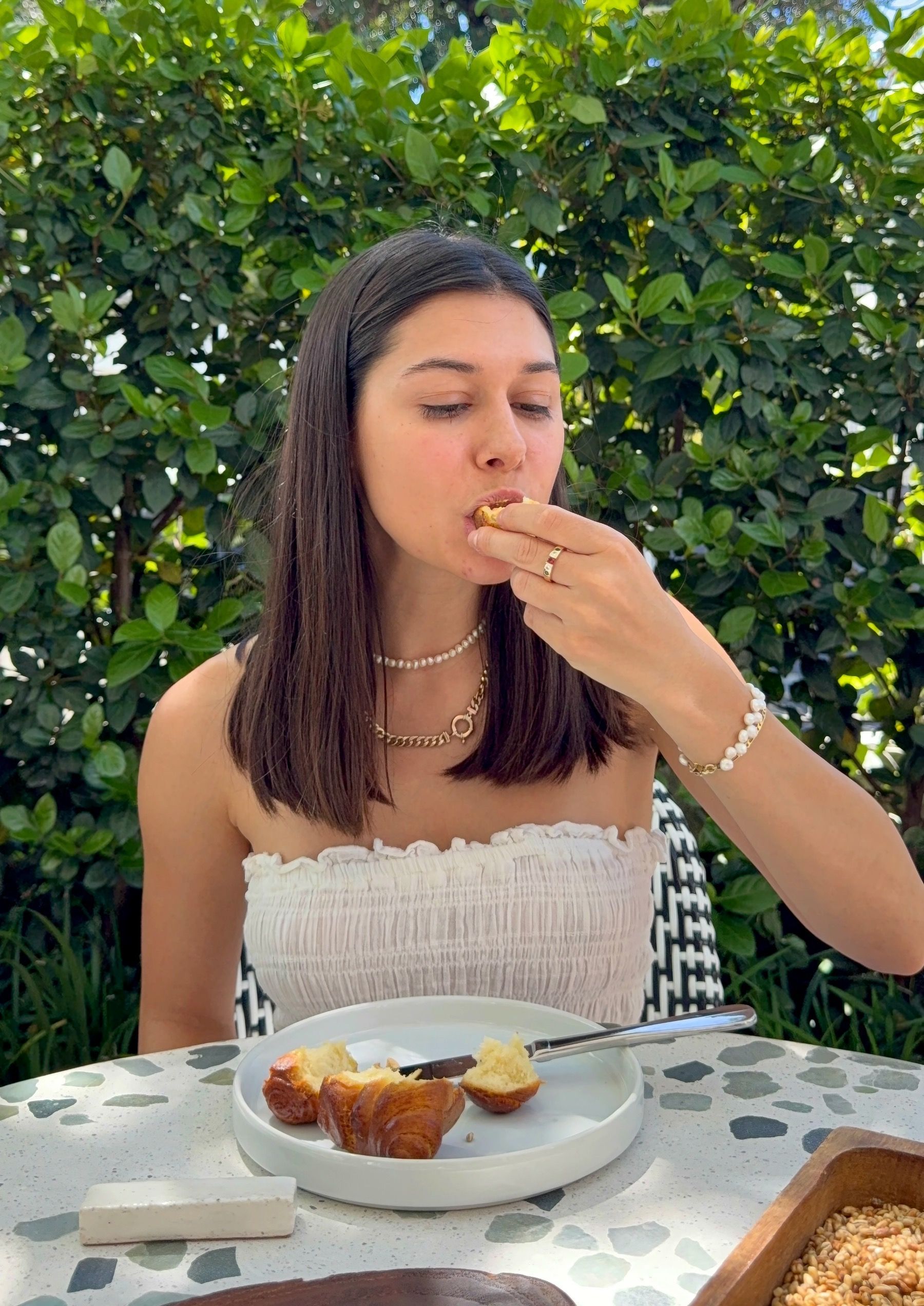 Paige eating kubaneh bread course at Upper Union Restaurant Week.