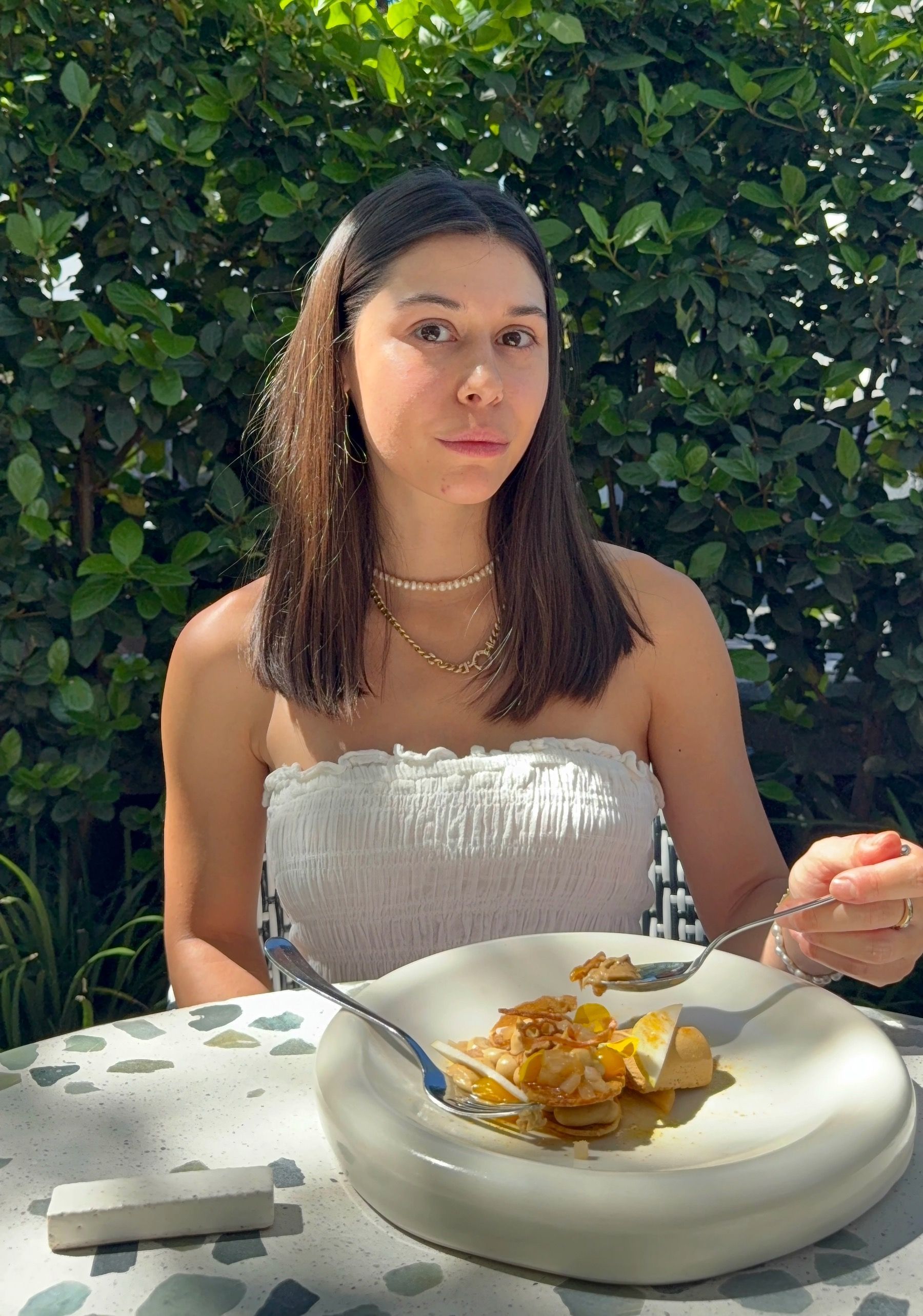 Paige eating rooibos poached pear with puff pastry, cremeaux, Clemengold citrus and burnt honey semifreddo, Upper Union