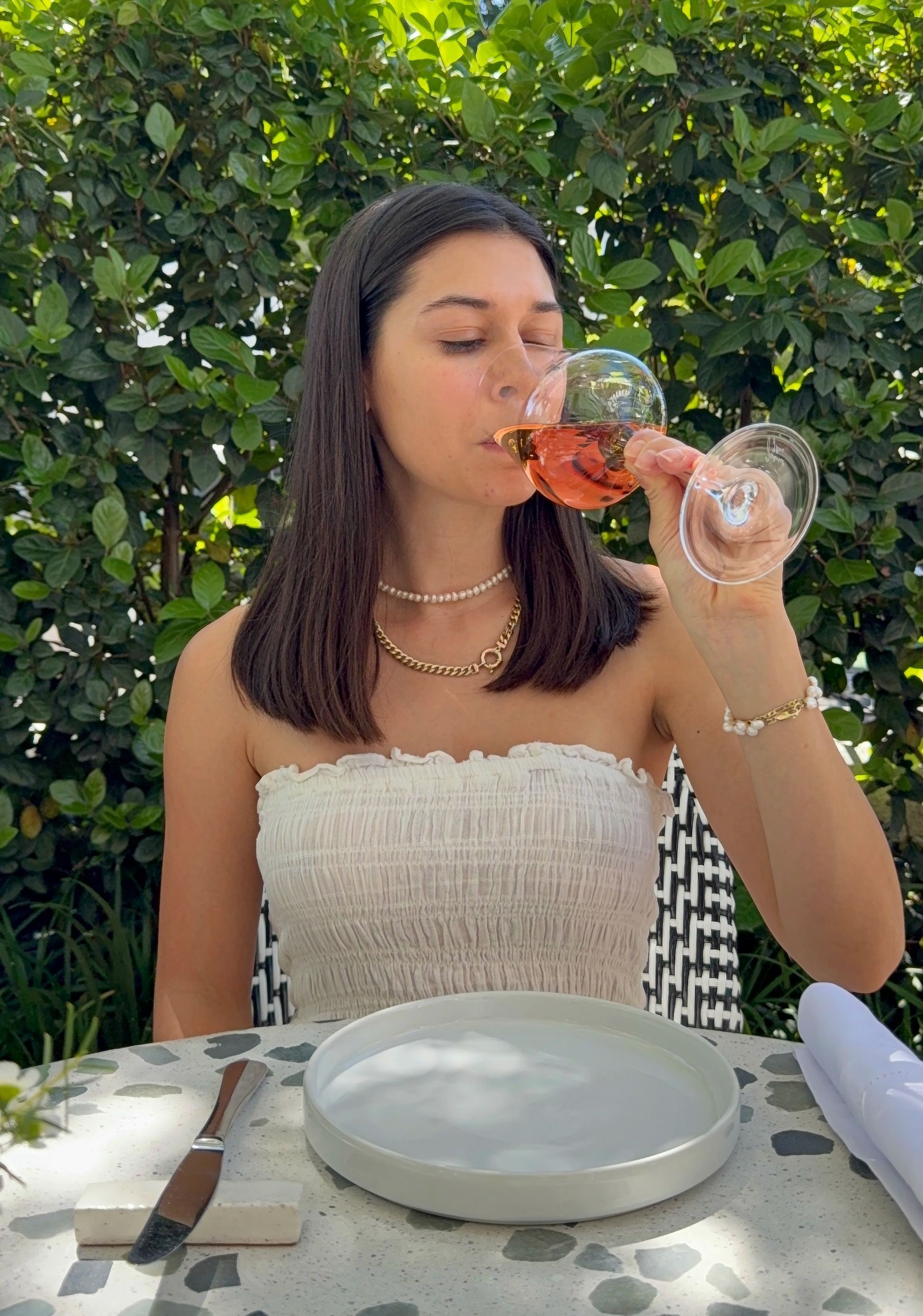 Paige drinking rosé during Restaurant Week at Upper Union Cape Town.