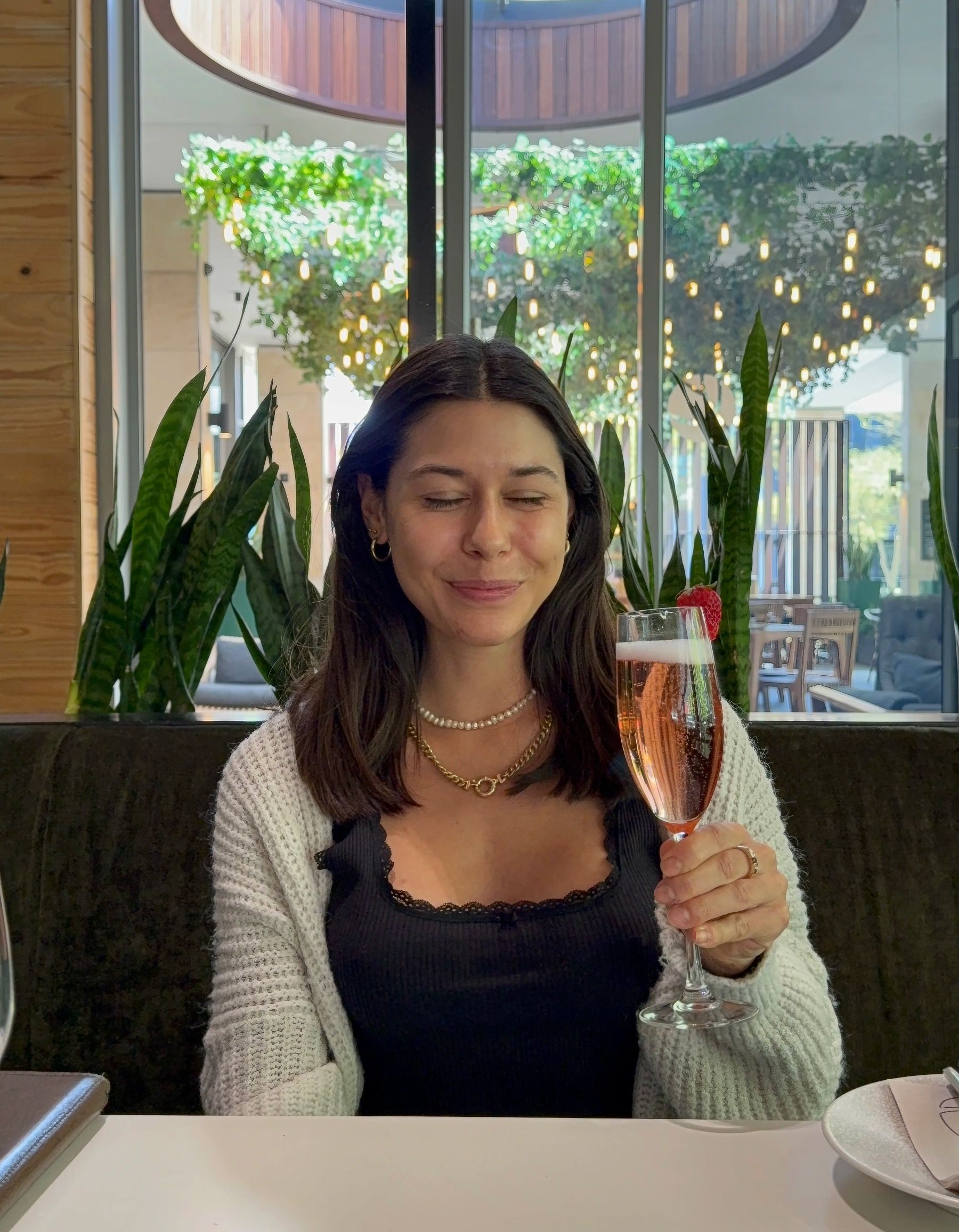 Paige is sipping Graham Beck Brut Rosé at Urban Umami in Century City during a curated dining experience