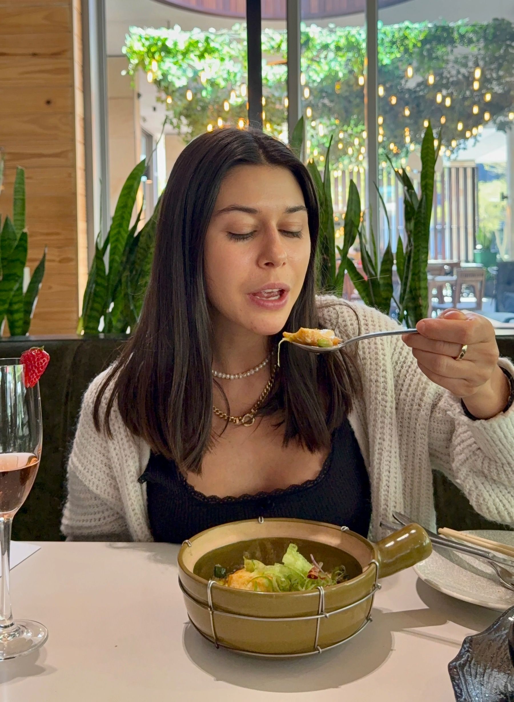 Paige is enjoying the Red Thai coconut curry linefish at Urban Umami