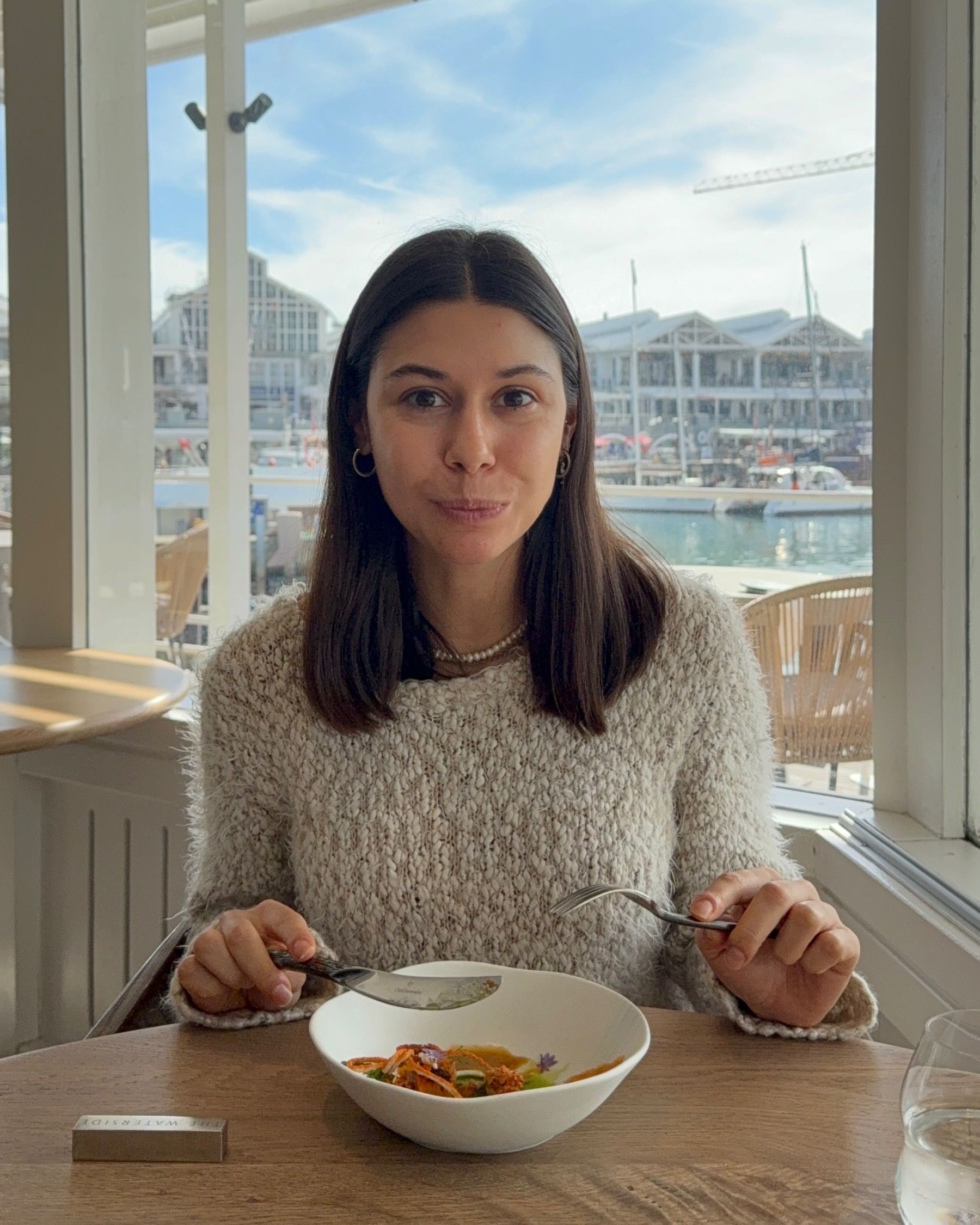 Paige enjoying the sweet potato starter dish at The Waterside Cape Town.
