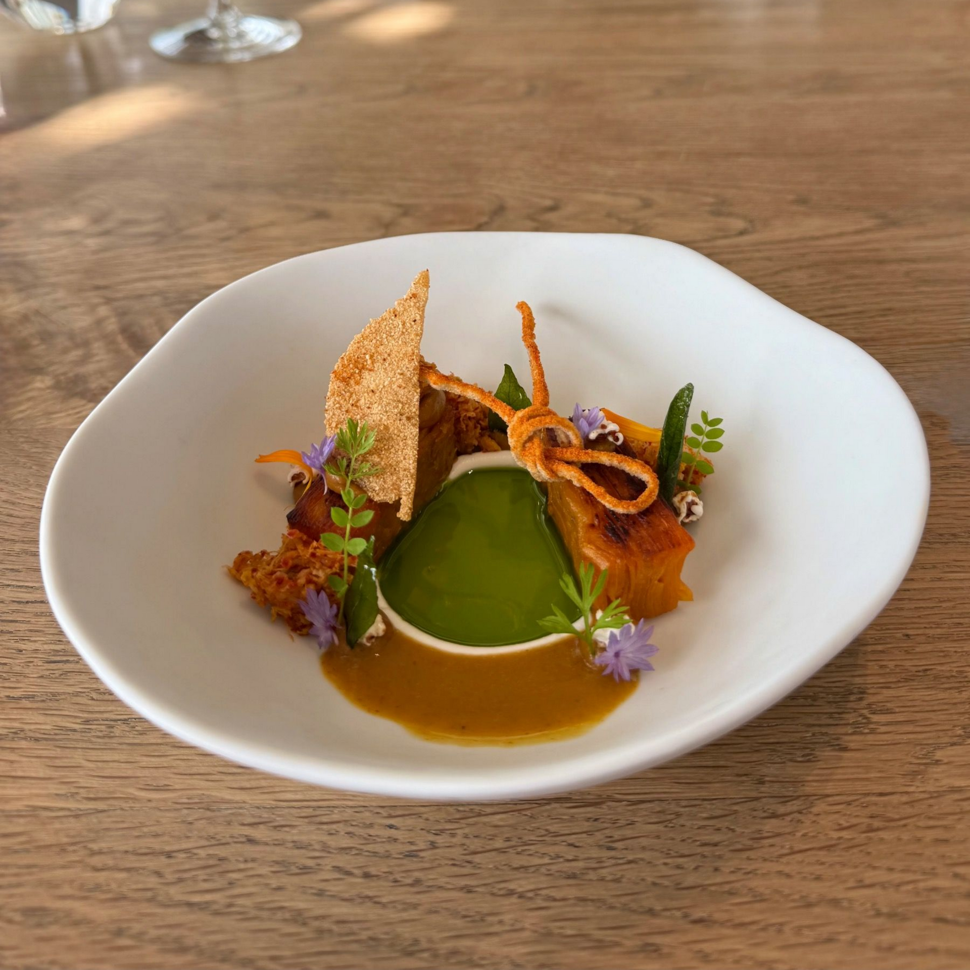 Plated sweet potato starter with refined garnishes at The Waterside restaurant.
