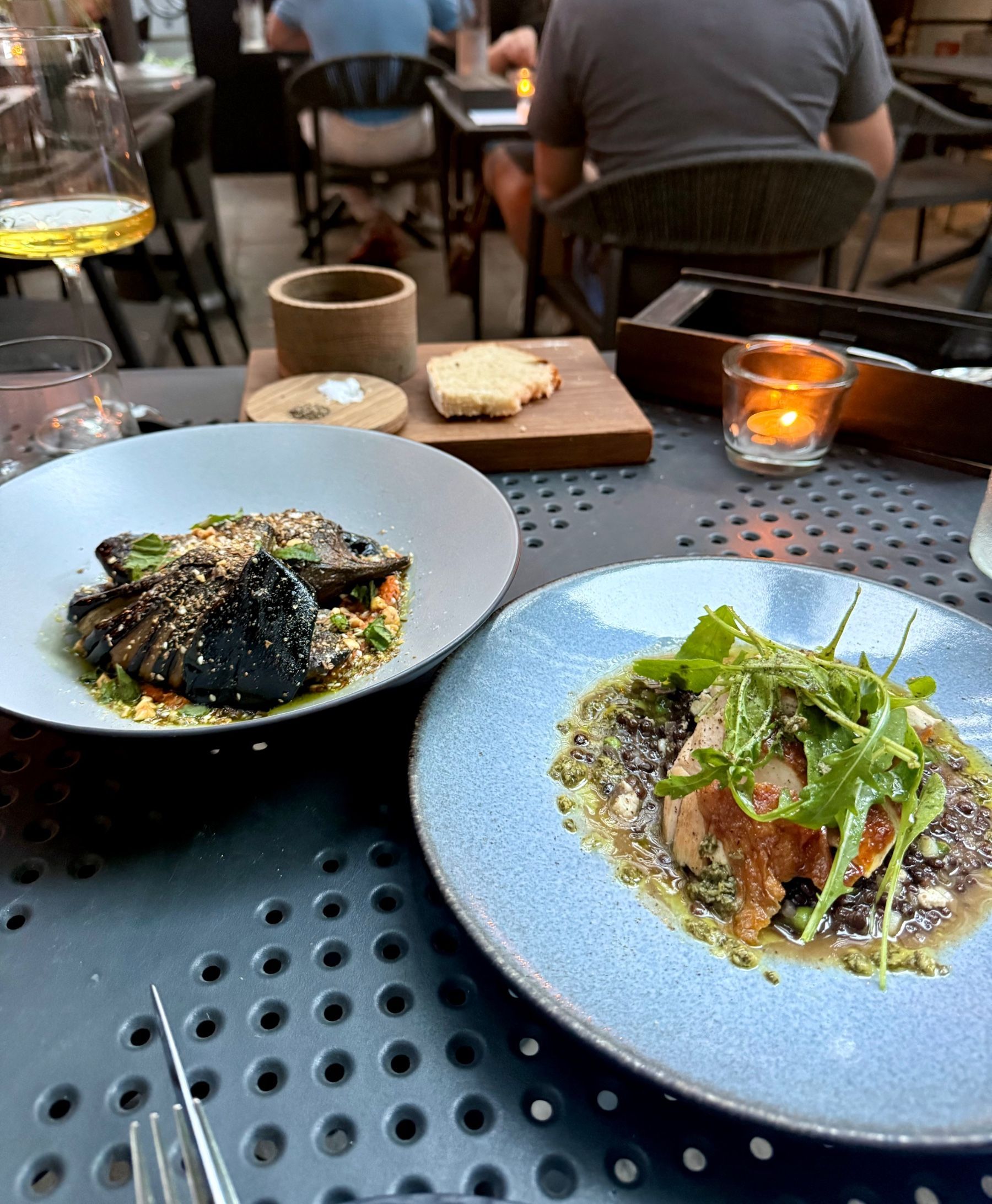 ëlgr restaurant dishes with aubergine and chicken served with beluga lentils at Cape Town restaurant
