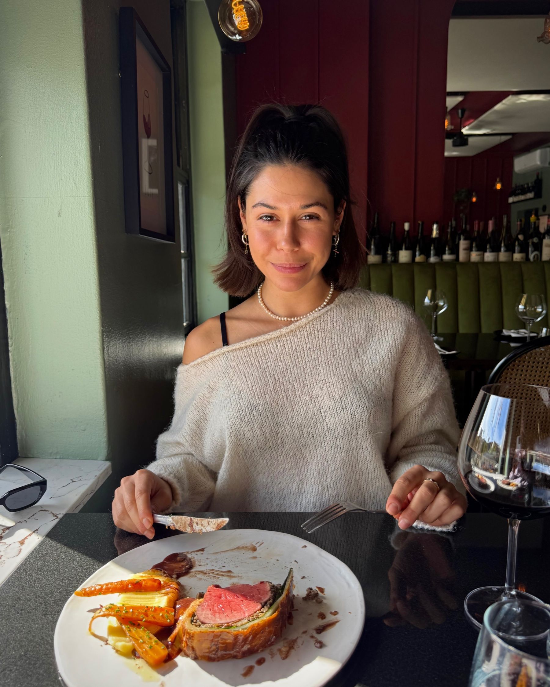 Paige enjoying a bowl of penne puttanesca at Massimo’s.