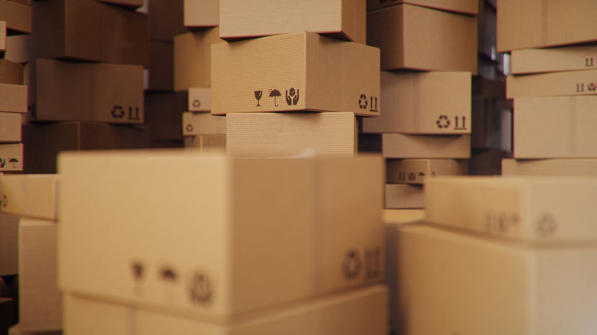 Background of cardboard boxes inside a warehouse, showcasing reliable packing supplies.