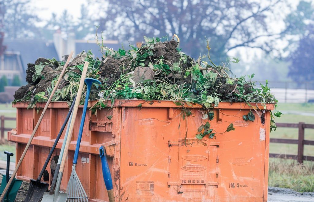 Yard waste disposal using a dumpster rental in Granbury, TX