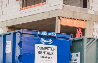 Yard waste disposal using a dumpster rental in Granbury, TX