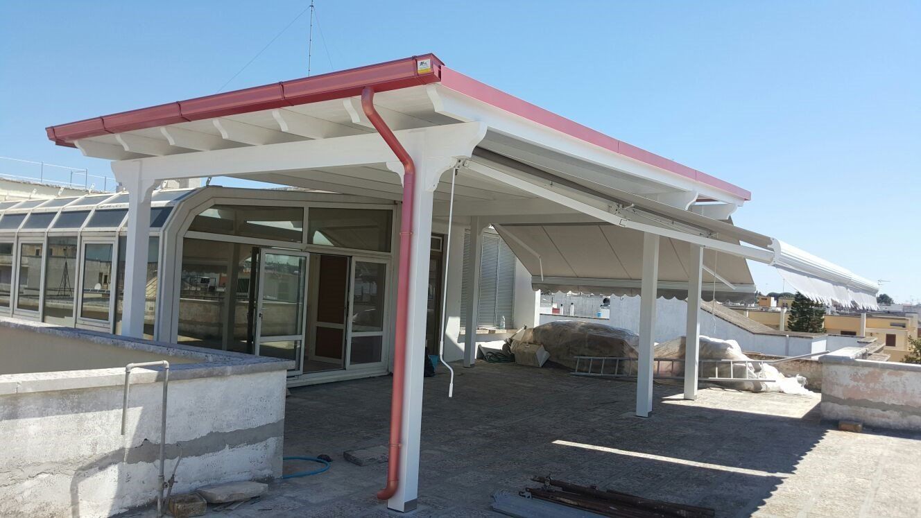 Copertura in legno lamellare con tende Giove Star