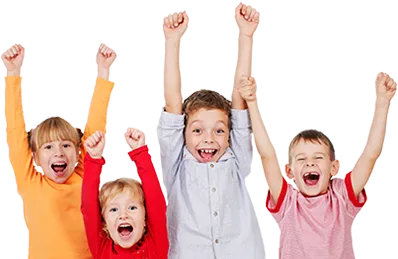 A group of children are raising their arms in the air
