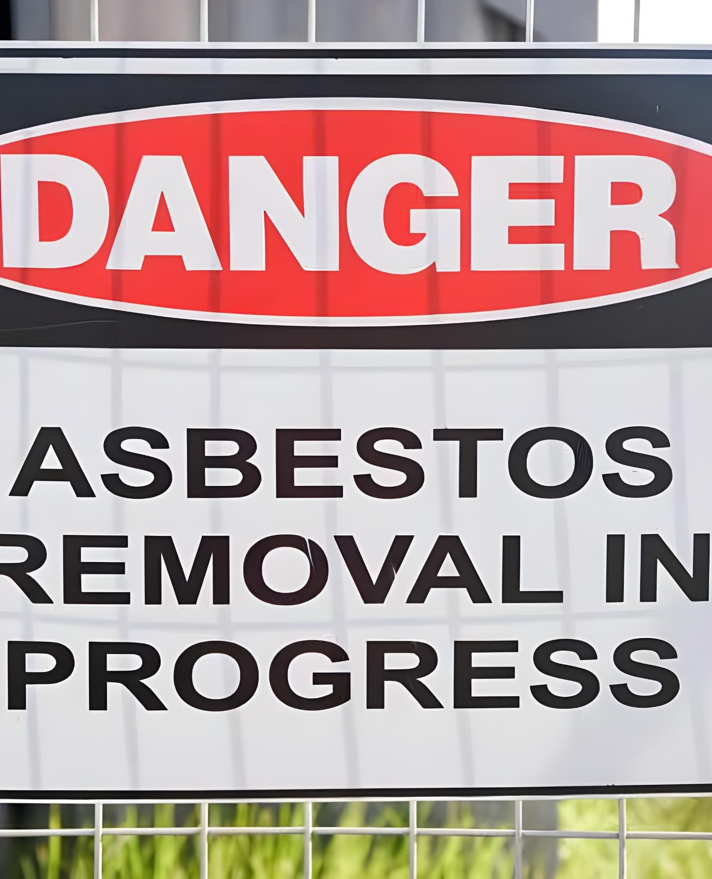 A Danger Sign That Says Asbestos Removal In Progress — Coast & Country Insurance Consultants Pty Ltd In Central Coast, NSW