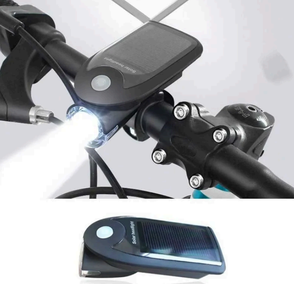 Una bicicleta con una luz fijada al manillar
