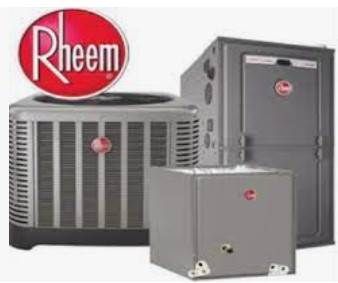a group of rheem air conditioners are sitting next to each other on a white background .
