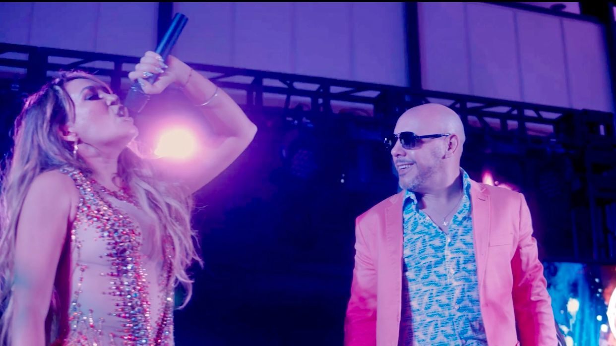 JLO and Pit Bull tribute artists perform at Miami conference in 2022, entertainment provided by Legend Entertainment Las Vegas.